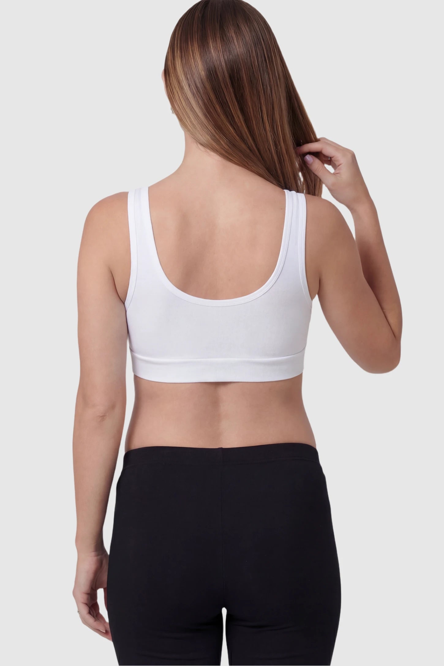 Soft Cotton Crossover Wireless Maternity Nursing Bra Soft Cotton Crossover Wireless Pull-On Maternity Nursing Bra in White on a pregnant model.