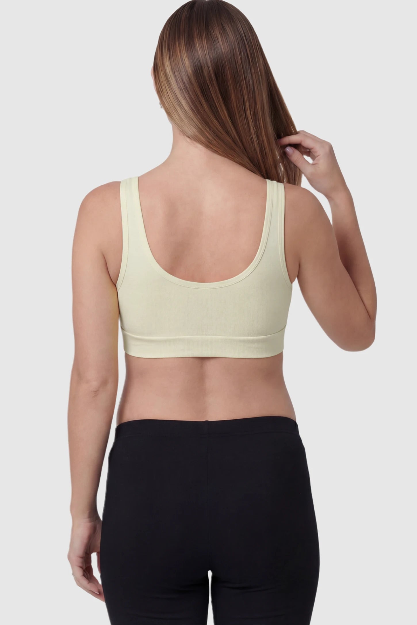 Soft Cotton Crossover Wireless Maternity Nursing Bra Soft Cotton Crossover Wireless Pull-On Maternity Nursing Bra in Yellow on a pregnant model.