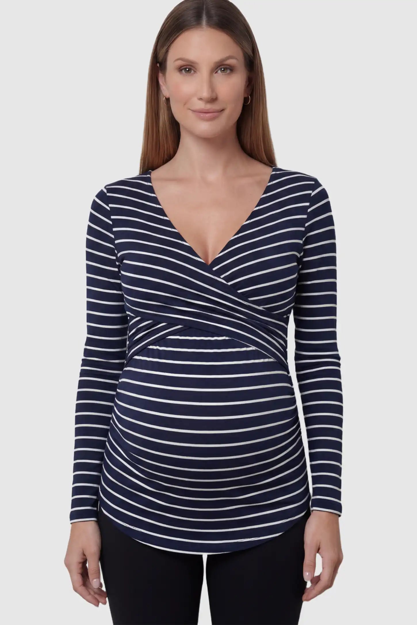 Striped Wrap Front Nursing Top in navy blue with crossover neckline on a pregnant model.