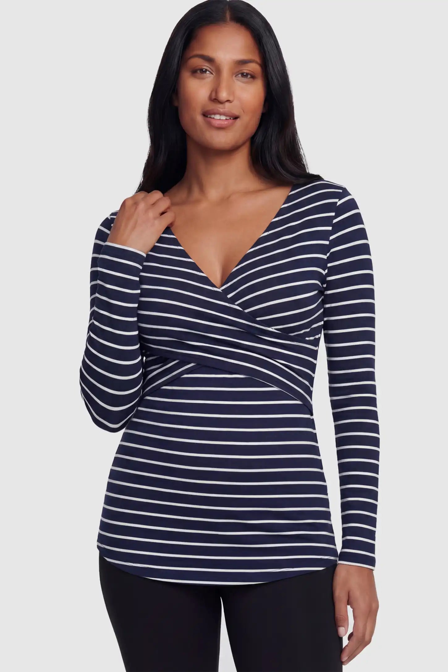 Striped Wrap Front Maternity & Nursing Top Striped Wrap Front Nursing Top in navy blue with crossover neckline on a postpartum model.