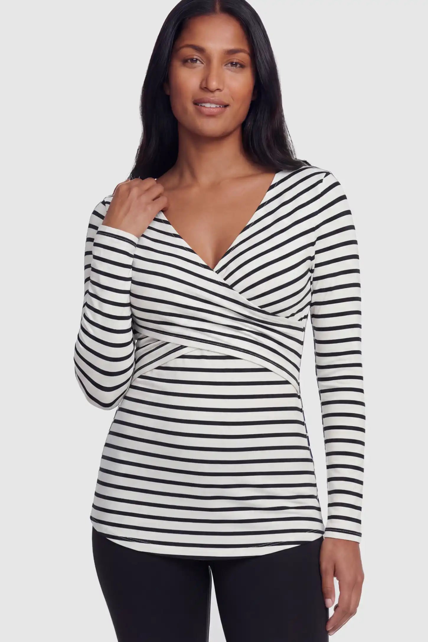 Striped Wrap Front Maternity & Nursing Top Striped Wrap Front Nursing Top in white with crossover neckline on a postpartum model.