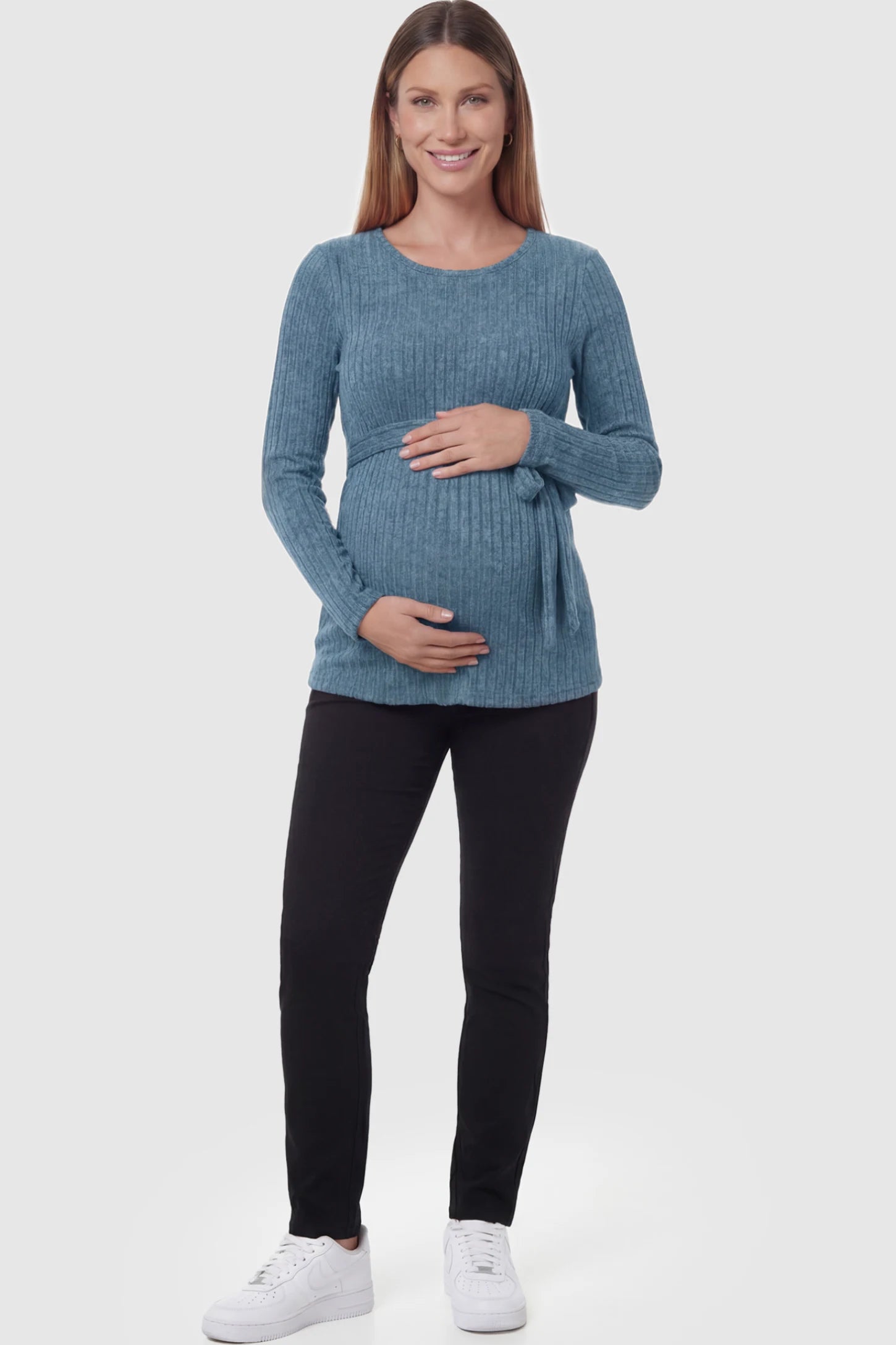 Ribbed Tie-Waist Long Sleeve Maternity Top Ribbed Tie-Waist Long Sleeve Maternity Top in Blue featuring an adjustable waist on a pregnant model.