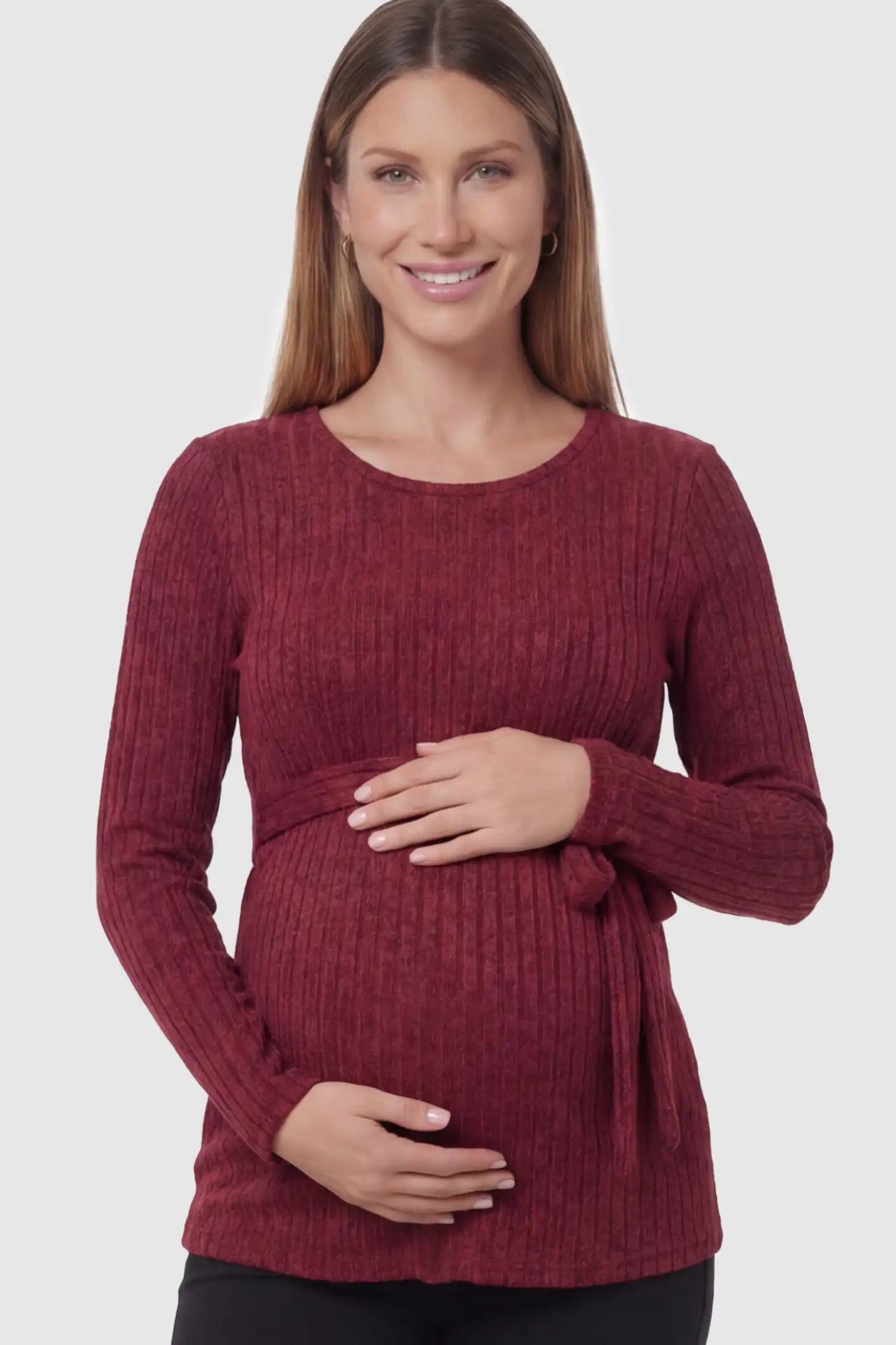 Ribbed Tie-Waist Long Sleeve Maternity Top Ribbed Tie-Waist Long Sleeve Maternity Top in Red featuring an adjustable waist on a pregnant model.