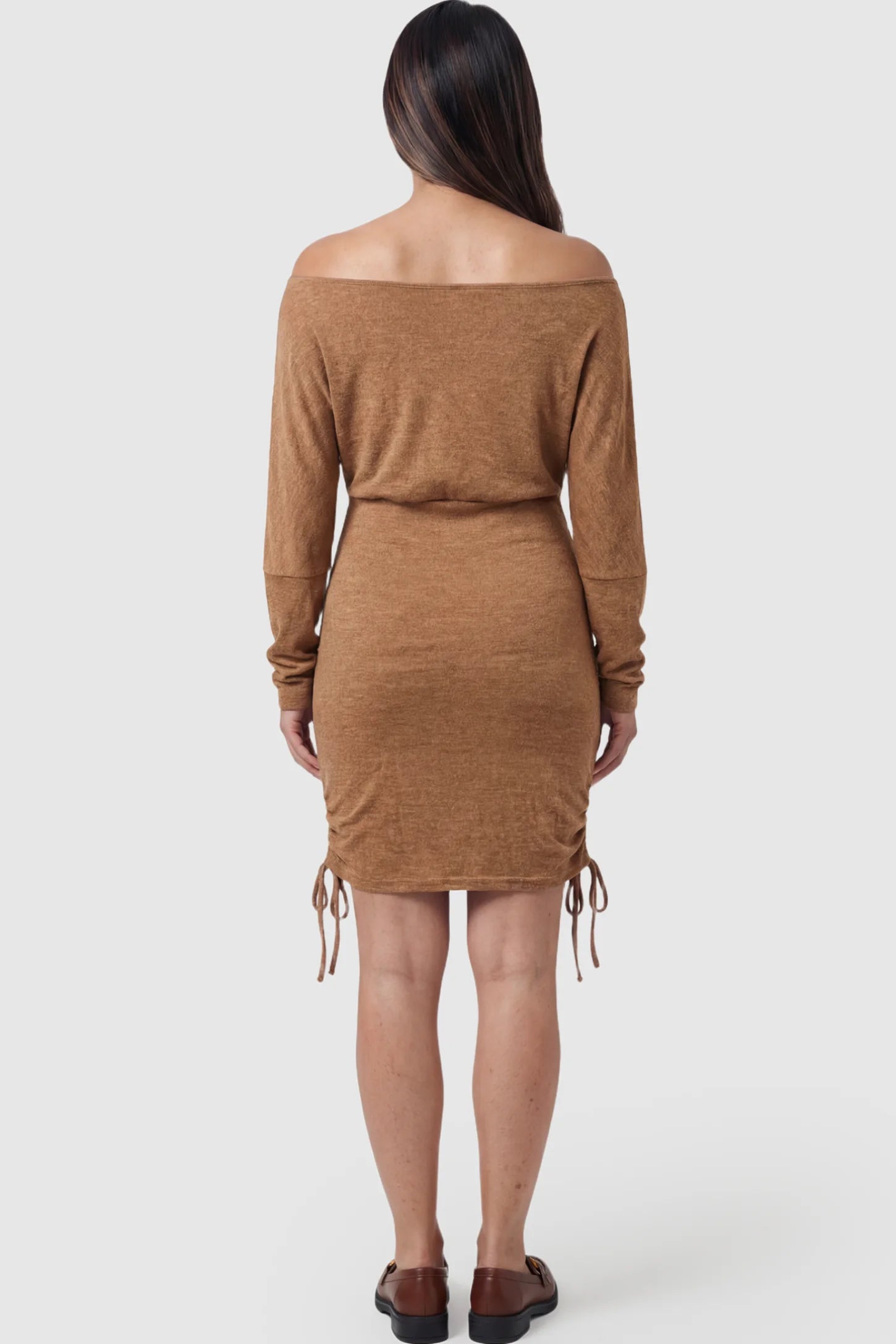 Ruched Drawstring Side Bodycon Maternity Short Dress Ruched Side Maternity Bodycon Dress in Brown featuring an off-the-shoulder neckline and drawstring detail on a pregnant model.