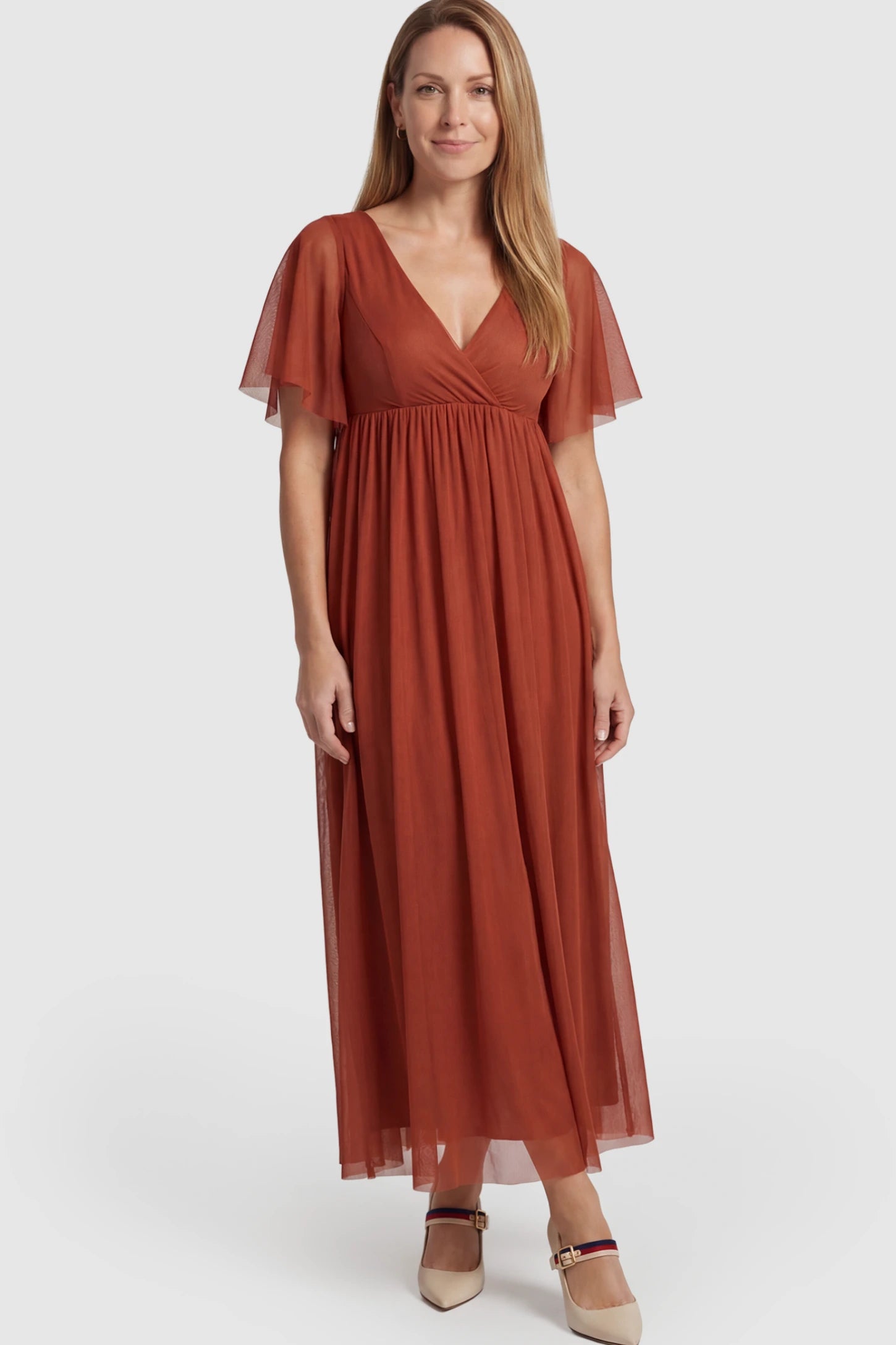 Chiffon Flutter Sleeve V-Neck Maternity Maxi Dress Chiffon Flutter Sleeve V-Neck Maternity Maxi Dress in Rust featuring a mesh overlay on a postpartum model.