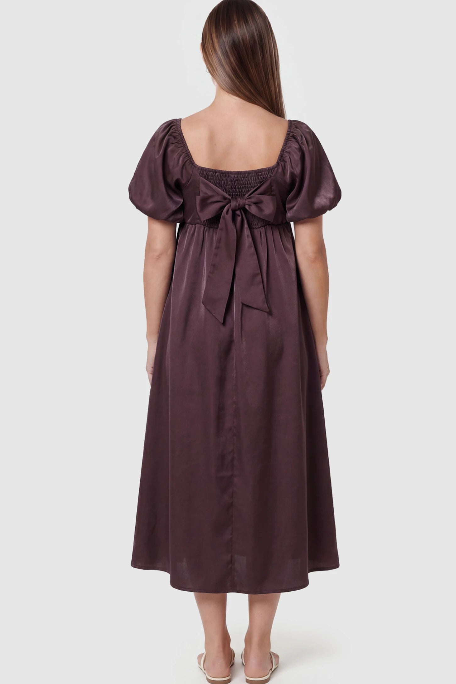 Puff Sleeve Square Neck Maternity Midi Dress Puff Sleeve Square Neck Midi Maternity Dress in Dark Brown featuring a Tie-back on a pregnant model.