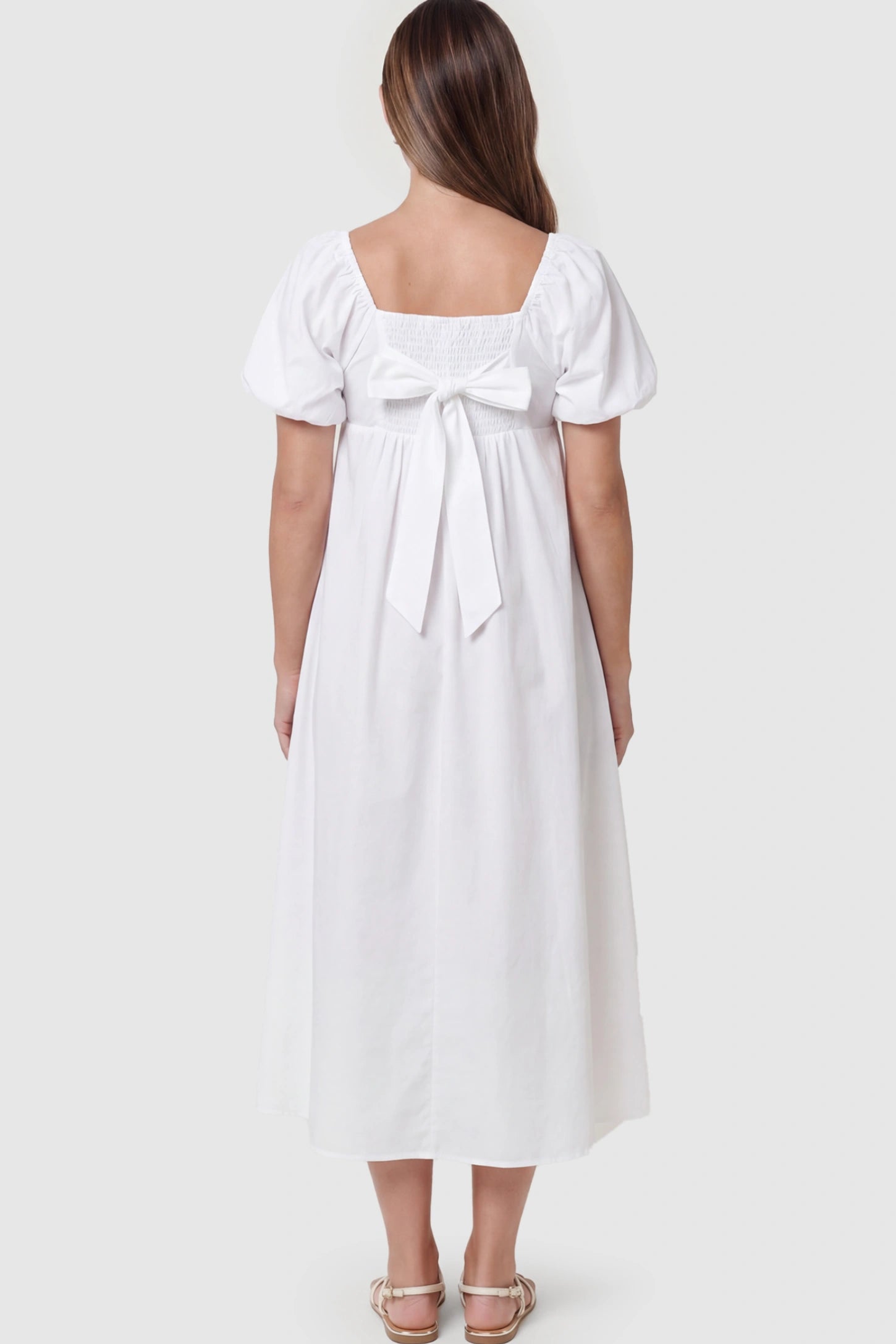 Puff Sleeve Square Neck Maternity Midi Dress Puff Sleeve Square Neck Midi Maternity Dress in White featuring a Tie-back on a pregnant model.