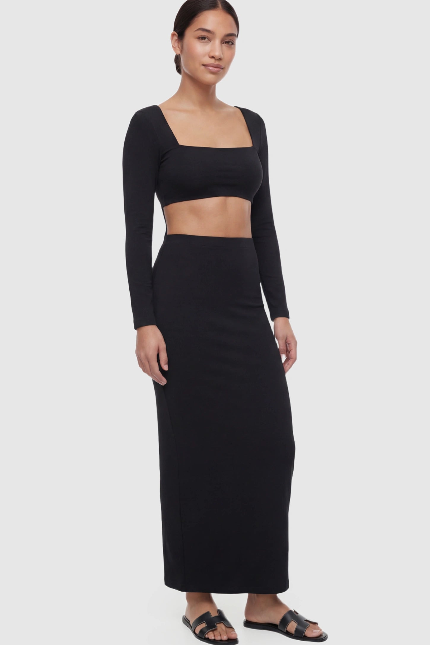 Solid Square Neck Long Sleeve Bodycon Maternity Maxi Dress Solid Square Neck Long Sleeve Bodycon Maternity Maxi Dress in Black featuring a bodycon fit on a postpartum model.