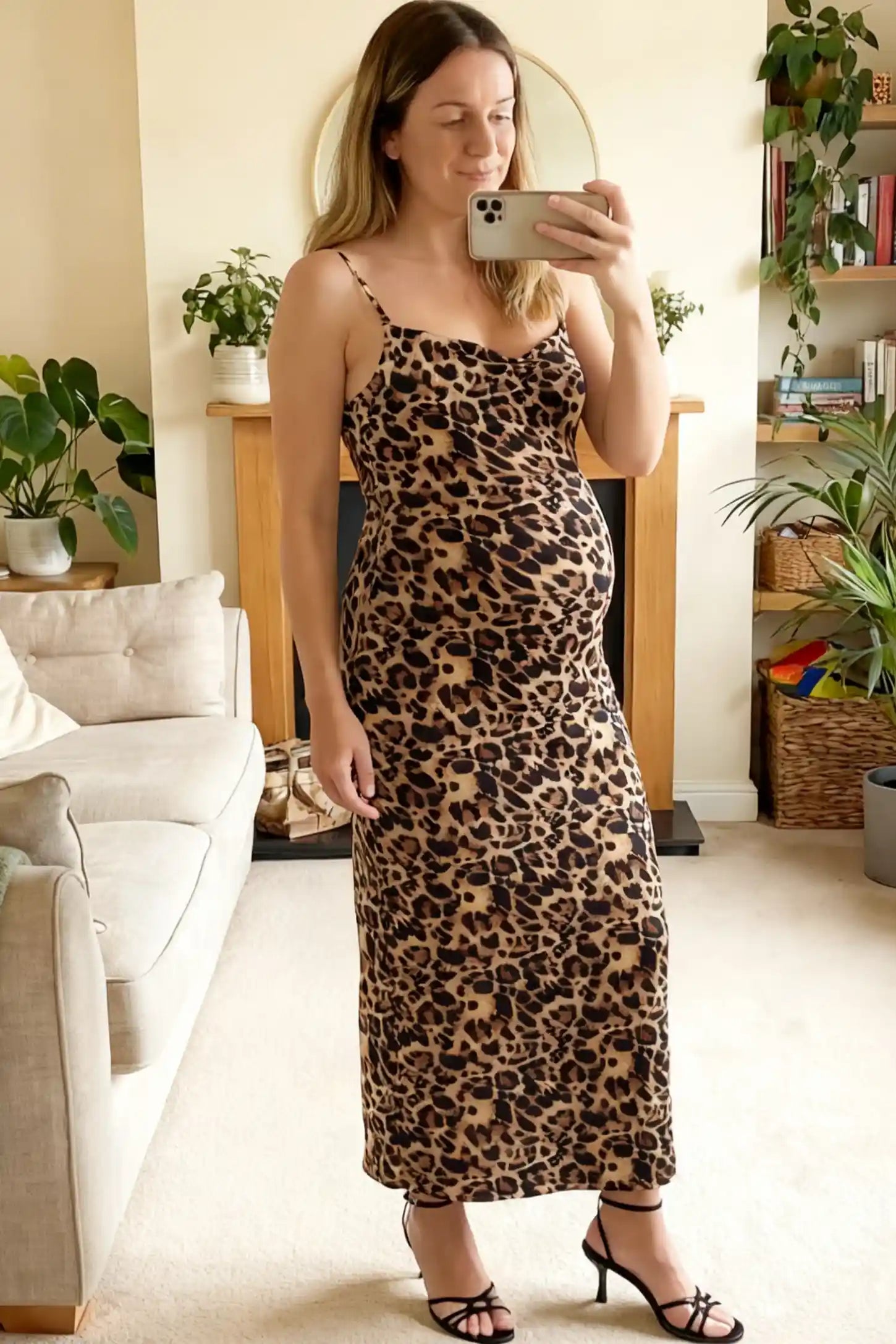 Leopard Print Spaghetti Strap Bodycon Maternity Maxi Dress Leopard Print Spaghetti Strap Bodycon Maternity Maxi Dress featuring a slim-fitting silhouette on a pregnant model.