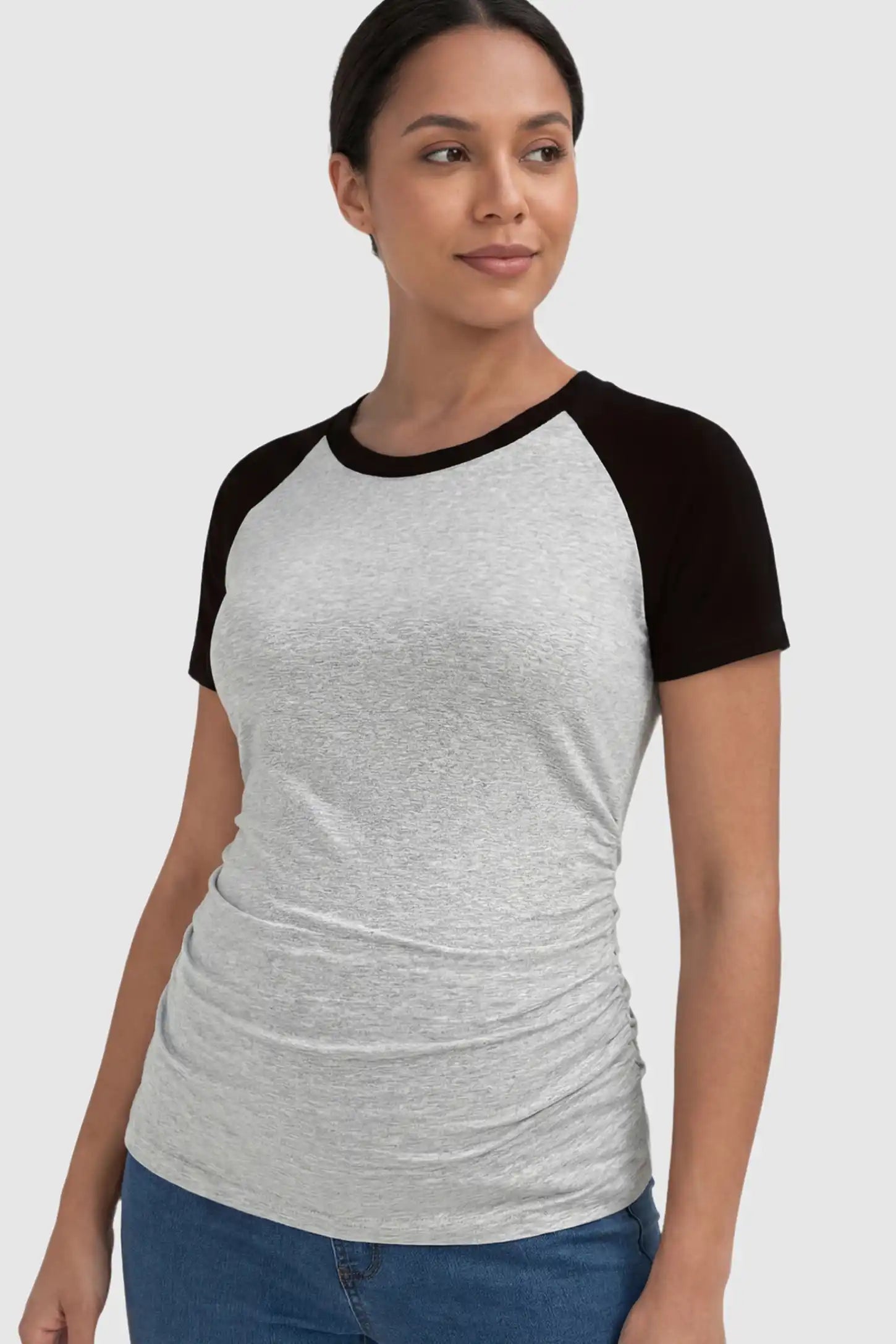 Ruched Raglan Short Sleeve Maternity T-Shirt Ruched Raglan Short Sleeve Maternity Top in Gray and Black featuring side-seam gathering on a non pregnant model.