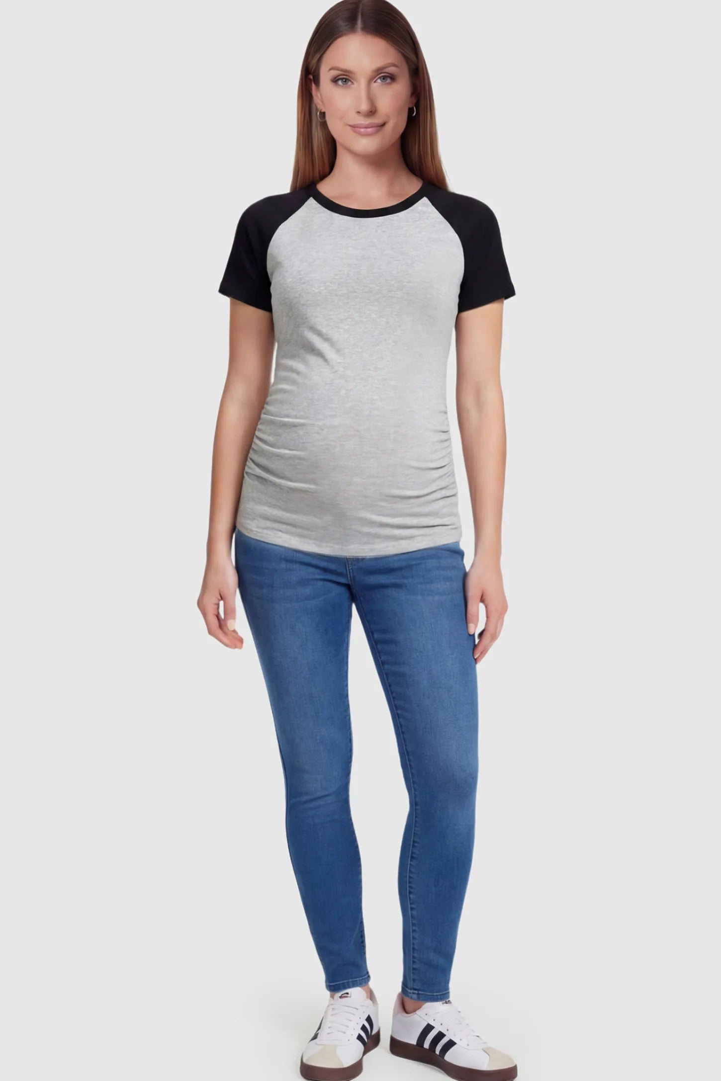 Ruched Raglan Short Sleeve Maternity T-Shirt Ruched Raglan Short Sleeve Maternity Top in Gray and Black featuring side-seam gathering on a pregnant model.