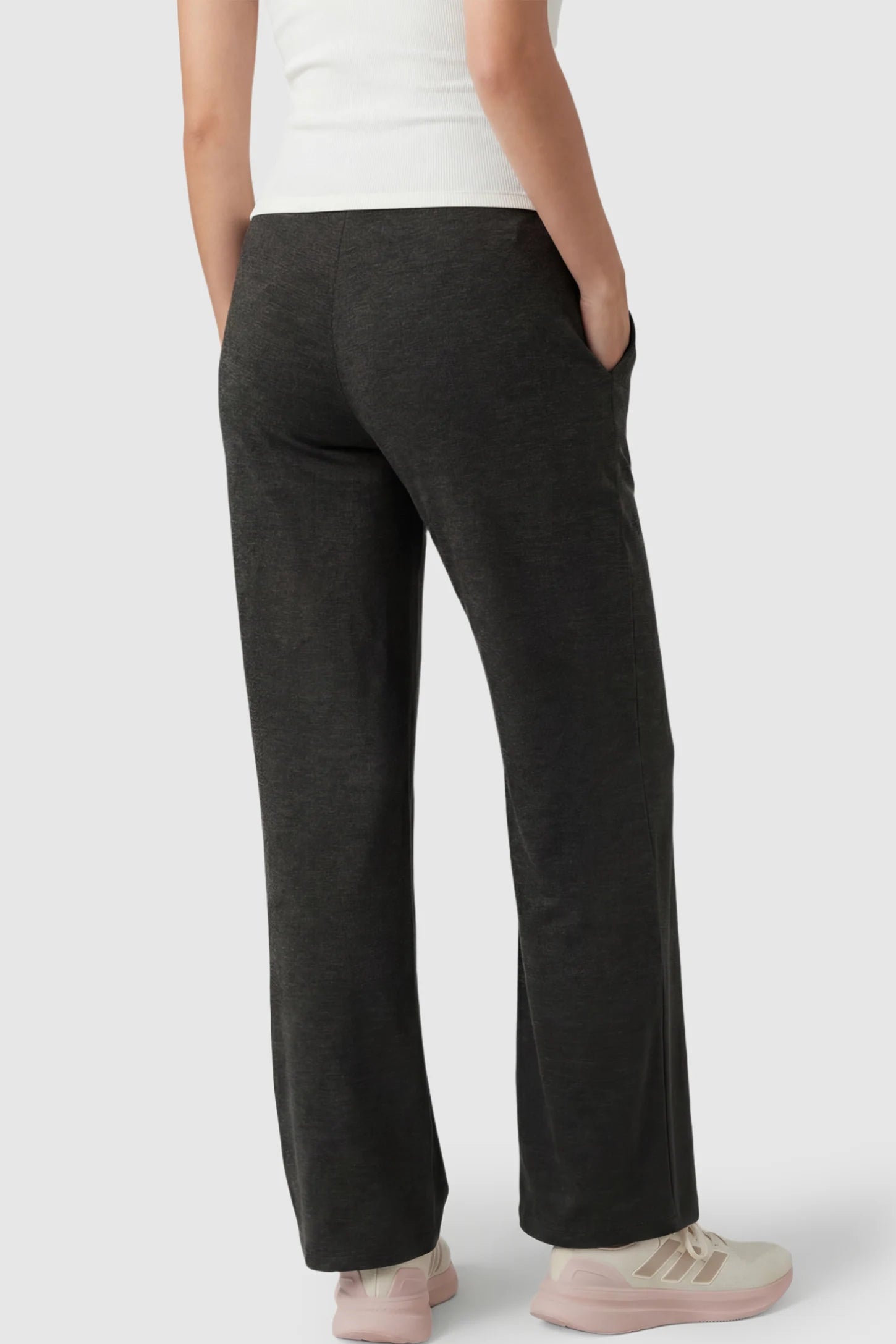 Fold-Over Waistband Wide Leg Maternity Pants Fold-Over Waistband Wide Leg Maternity Pants in Black featuring a versatile high-waist fit on a pregnant model showing back.