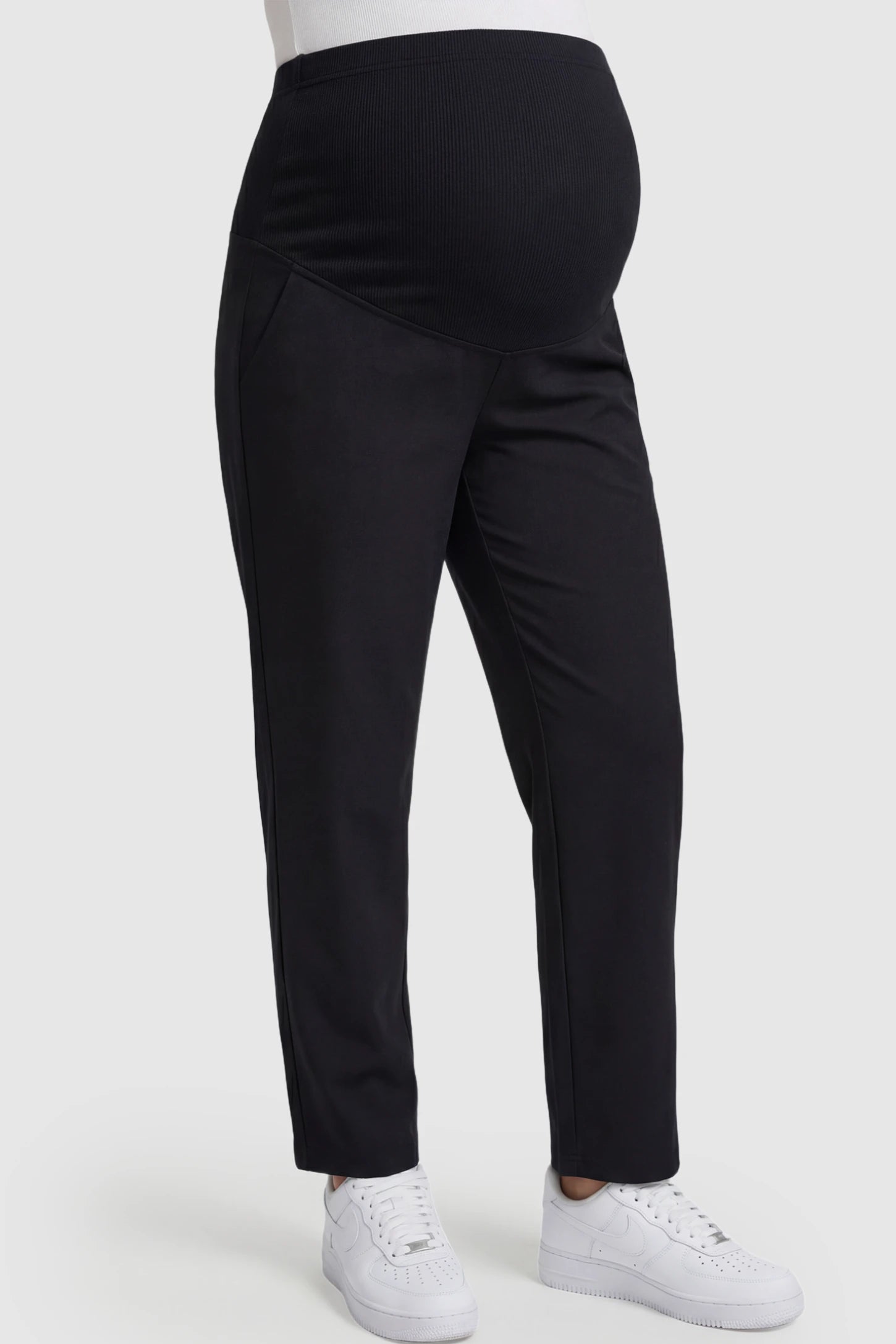 Elastic Mid Waist Straight Leg Maternity Pants in black featuring Elastic Waistband on a pregnant model.