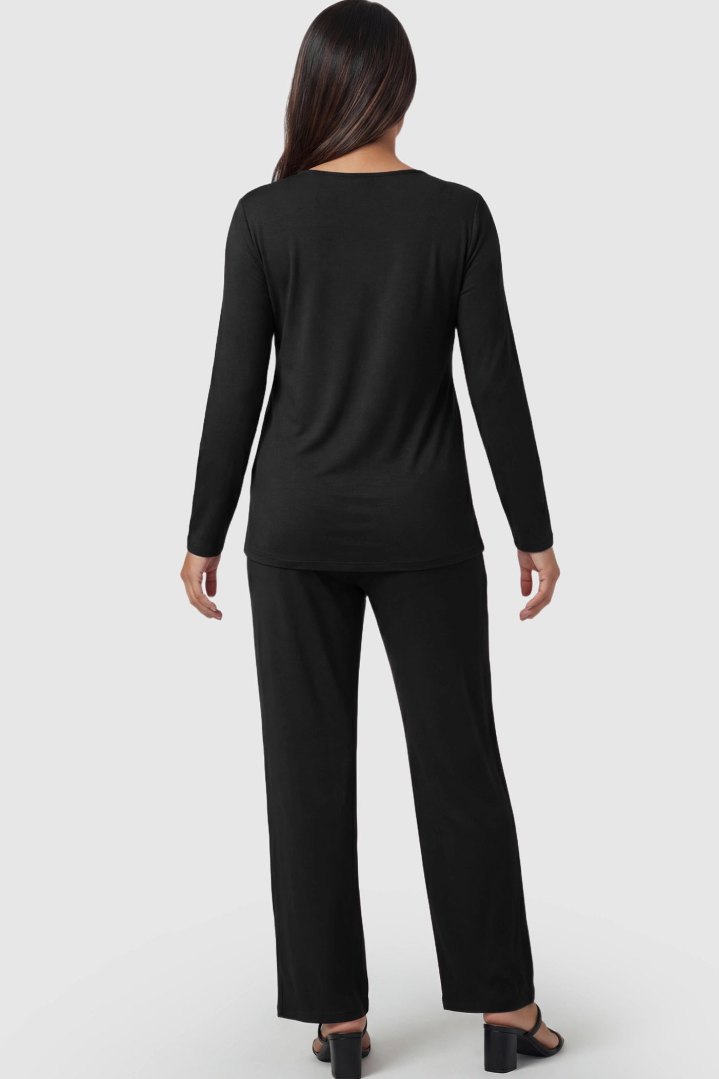V-Neck Long Sleeve Top with Long Pants Maternity Lounge Set V-Neck Long Sleeve Maternity Lounge Set in Black on a pregnant model.
