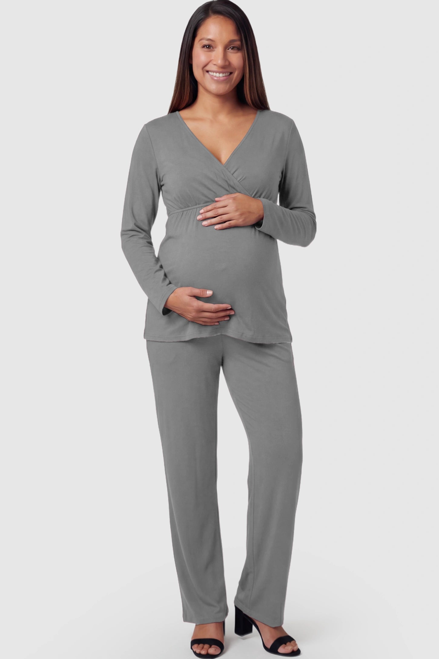 V-Neck Long Sleeve Top with Long Pants Maternity Lounge Set V-Neck Long Sleeve Maternity Lounge Set in Gray featuring a crossover front on a pregnant model.
