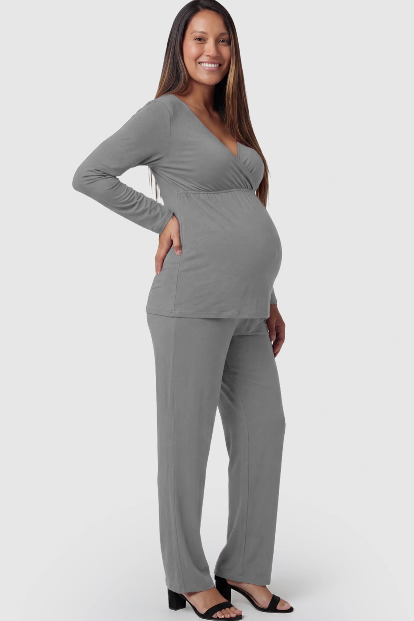 V-Neck Long Sleeve Top with Long Pants Maternity Lounge Set V-Neck Long Sleeve Maternity Lounge Set in Gray featuring a crossover front on a pregnant model.