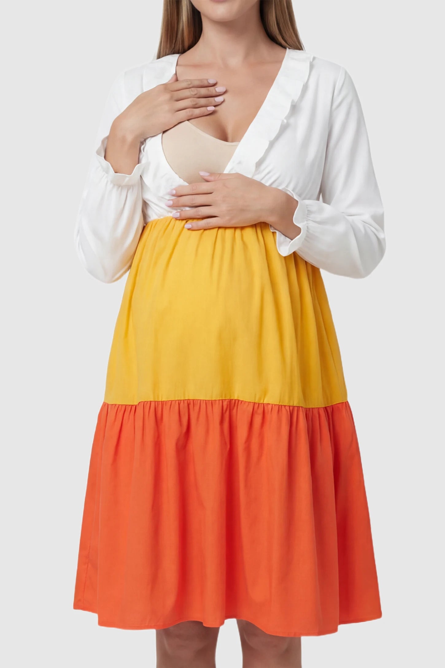 Ruffle V-Neck Colorblock Tiered Maternity Nursing Dress Ruffle V-Neck Colorblock Tiered Maternity Nursing Dress in White, Yellow, and Orange featuring a lift-up nursing panel.