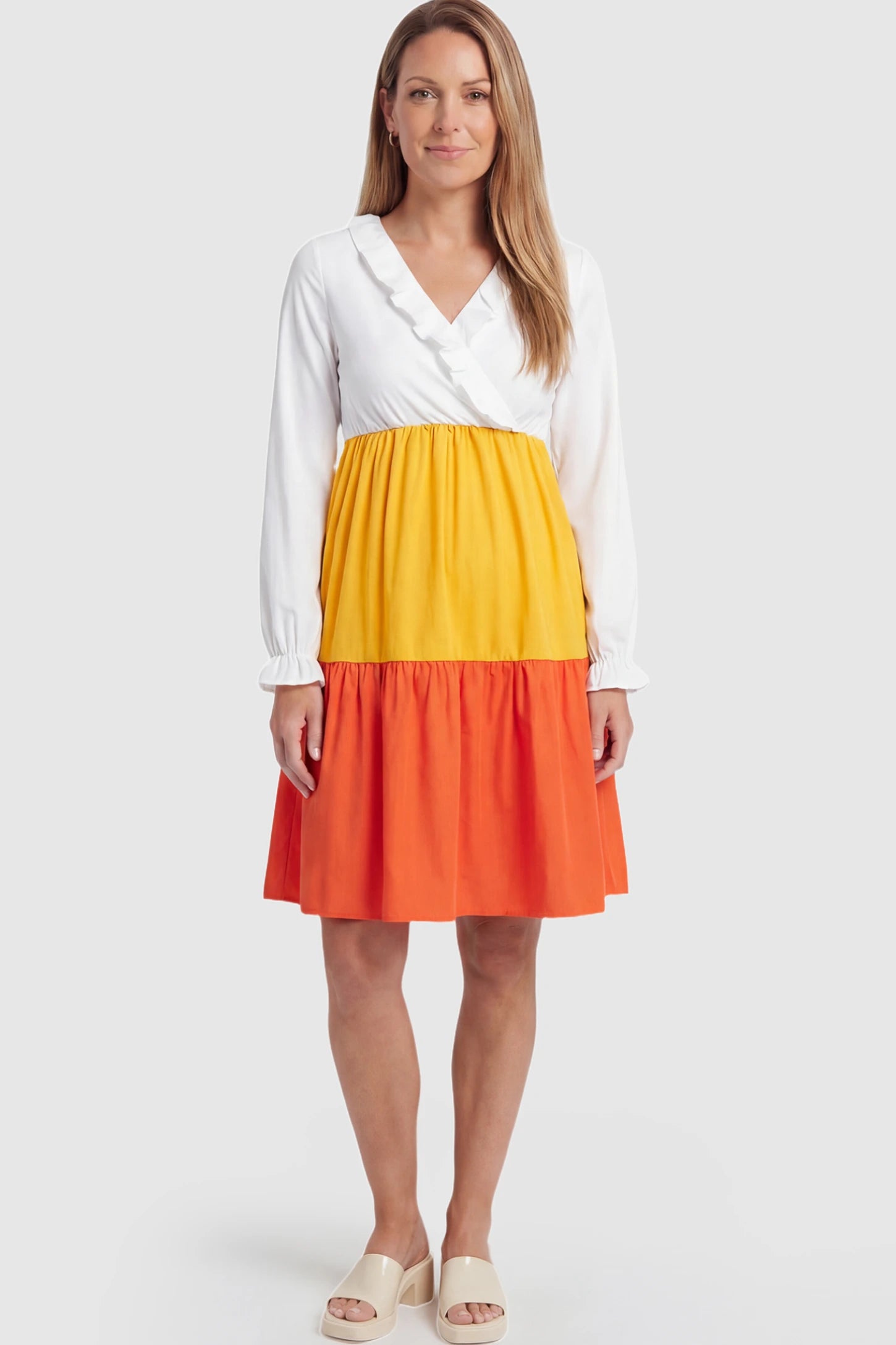 Ruffle V-Neck Colorblock Tiered Maternity Nursing Dress Ruffle V-Neck Colorblock Tiered Maternity Nursing Dress in White, Yellow, and Orange featuring a lift-up nursing panel.