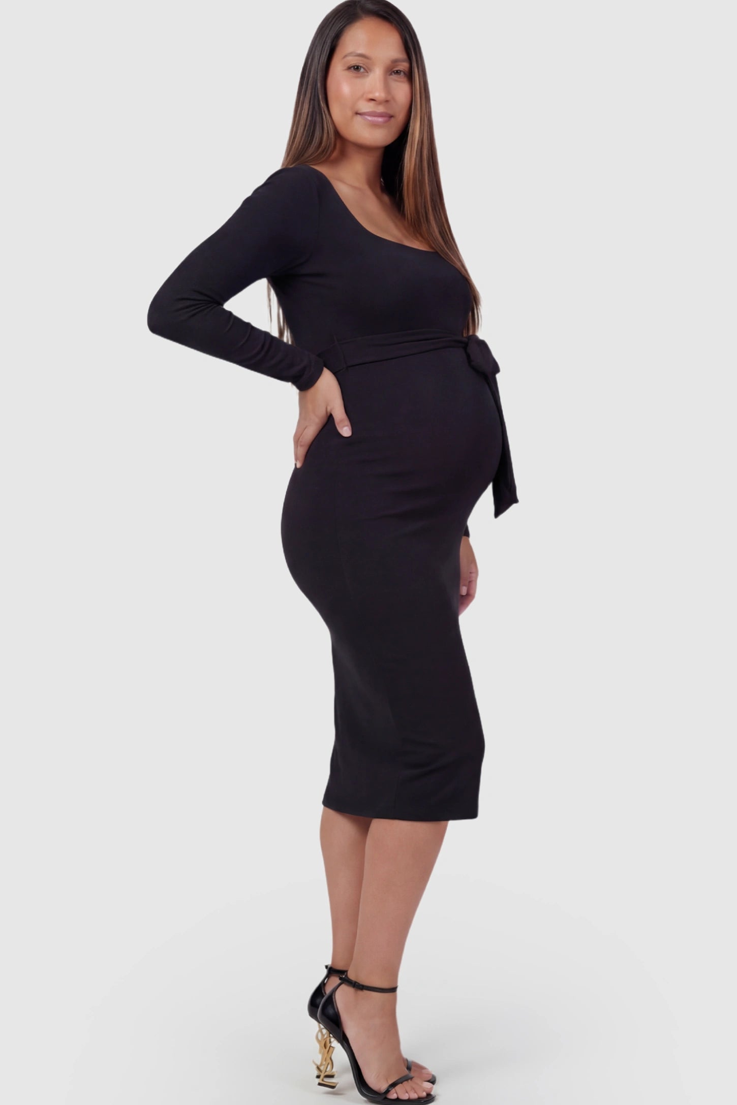 Square Neck Side-Tie Maternity Midi Dress in Black featuring a long-sleeve bodycon fit on a pregnant model.