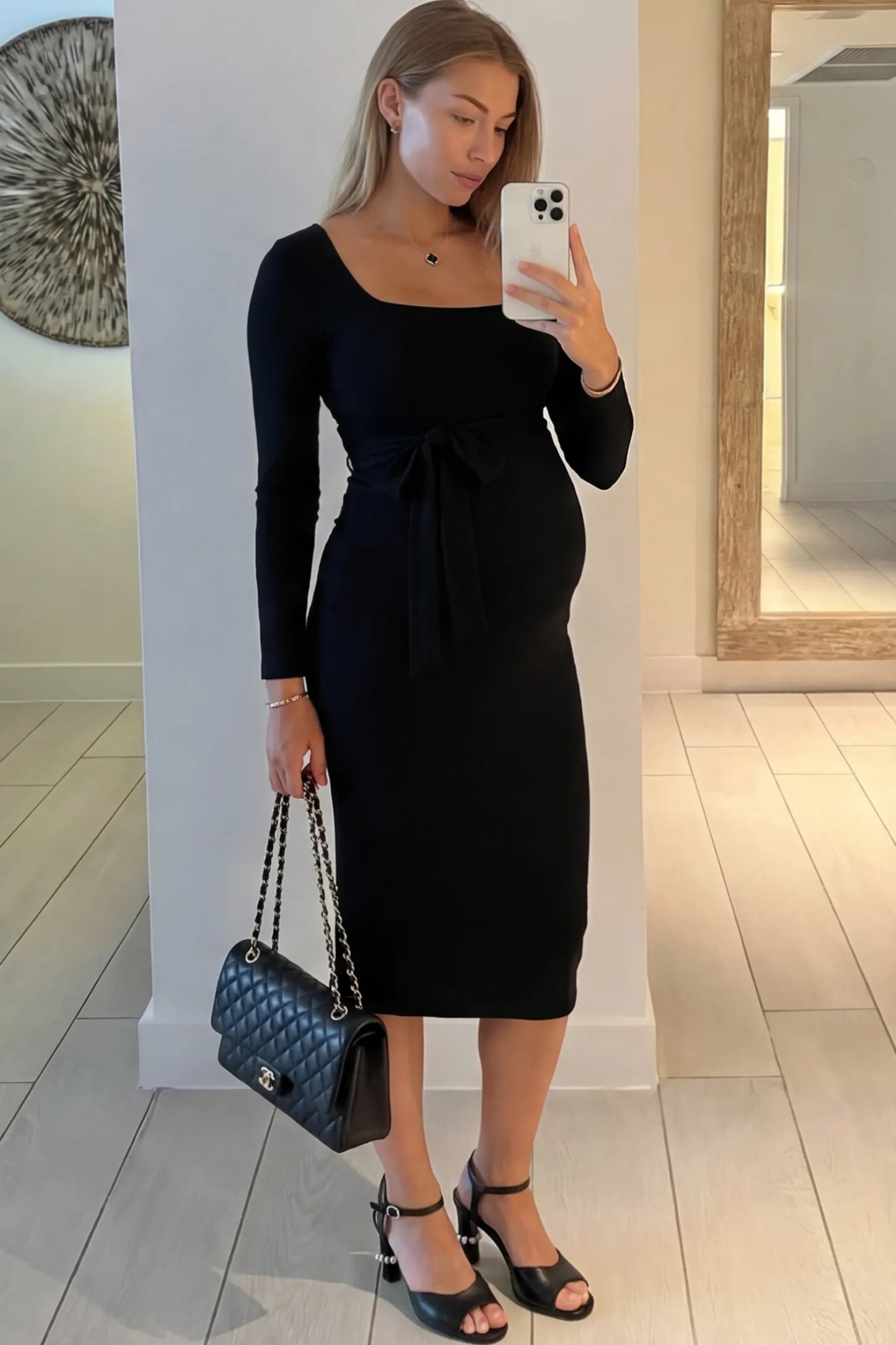 Square Neck Side-Tie Maternity Midi Dress Square Neck Side-Tie Maternity Midi Dress in Black featuring a long-sleeve bodycon fit on a pregnant model.