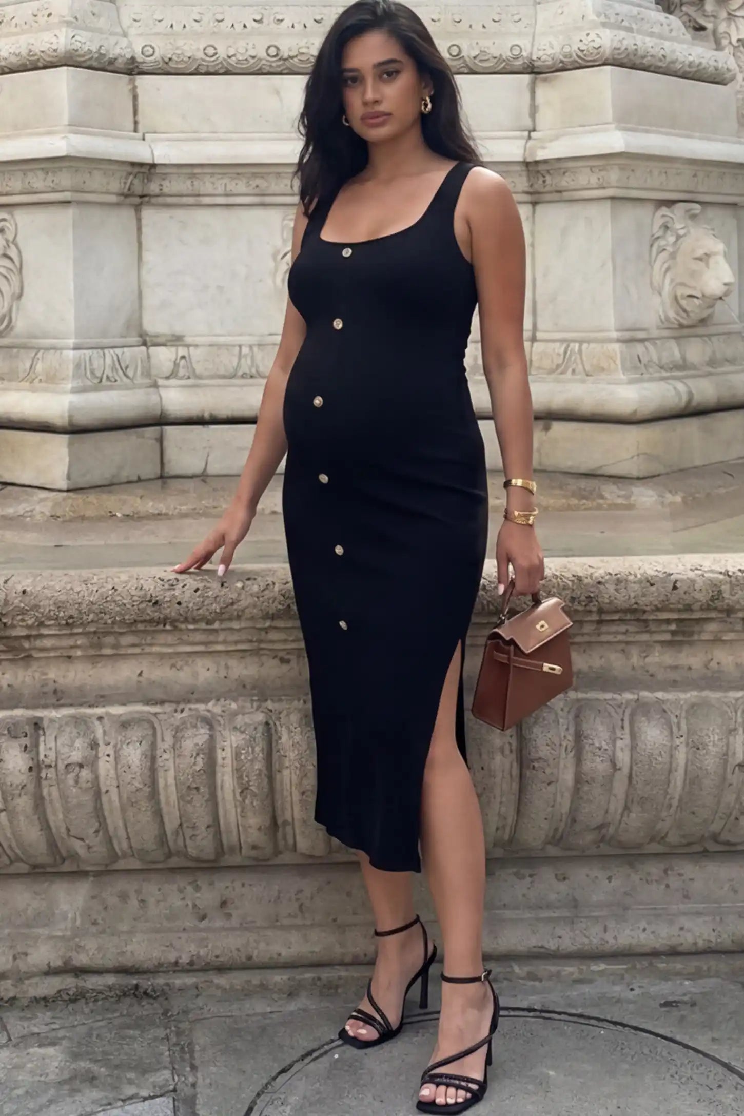 Ribbed Button Accent Side Slit Maternity Midi Dress Ribbed Button Accent Side Slit Maternity Midi Dress in Black featuring a flexible knit and decorative buttons on a pregnant model.