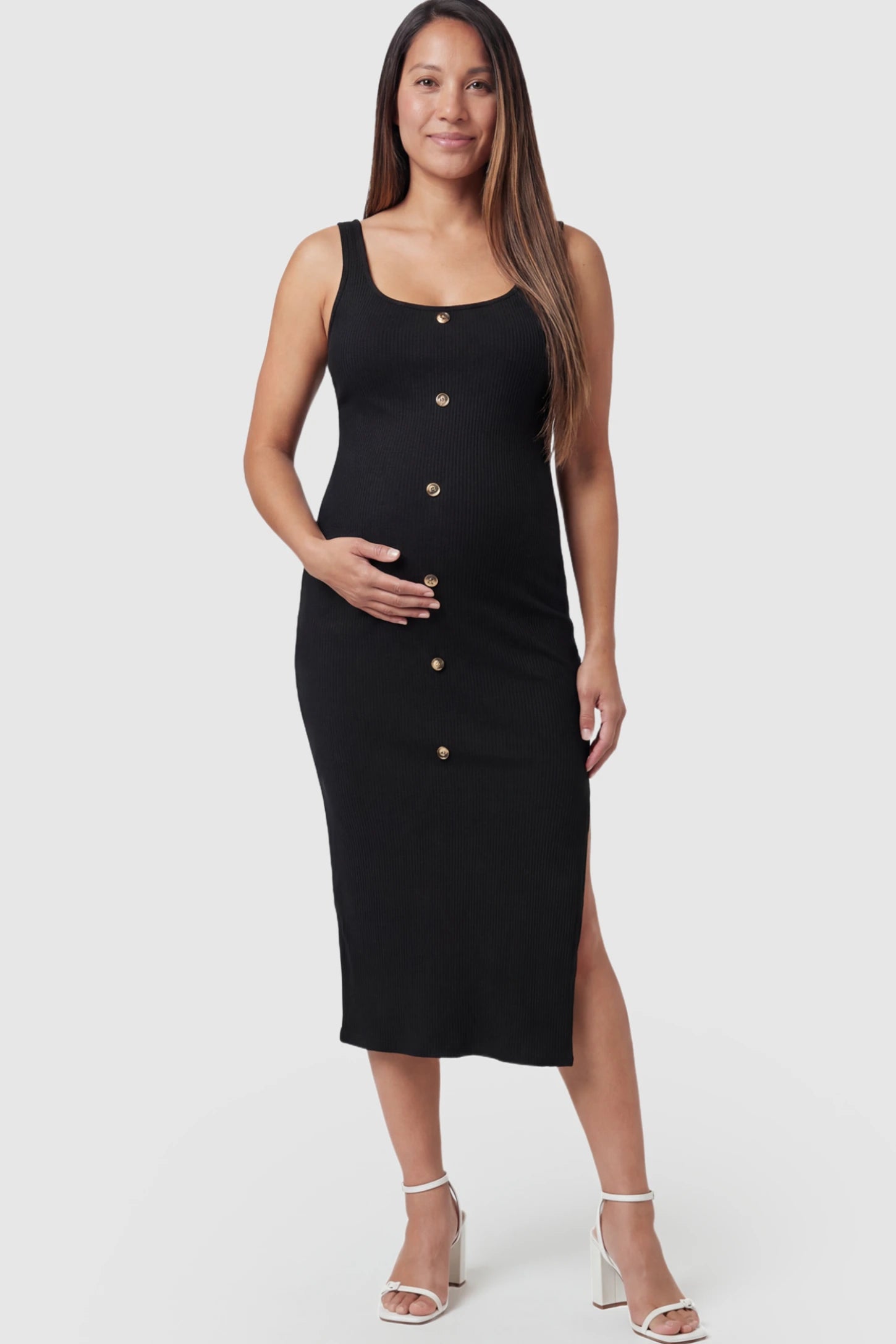 Ribbed Button Accent Side Slit Maternity Midi Dress Ribbed Button Accent Side Slit Maternity Midi Dress in Black featuring a flexible knit and decorative buttons on a pregnant model.