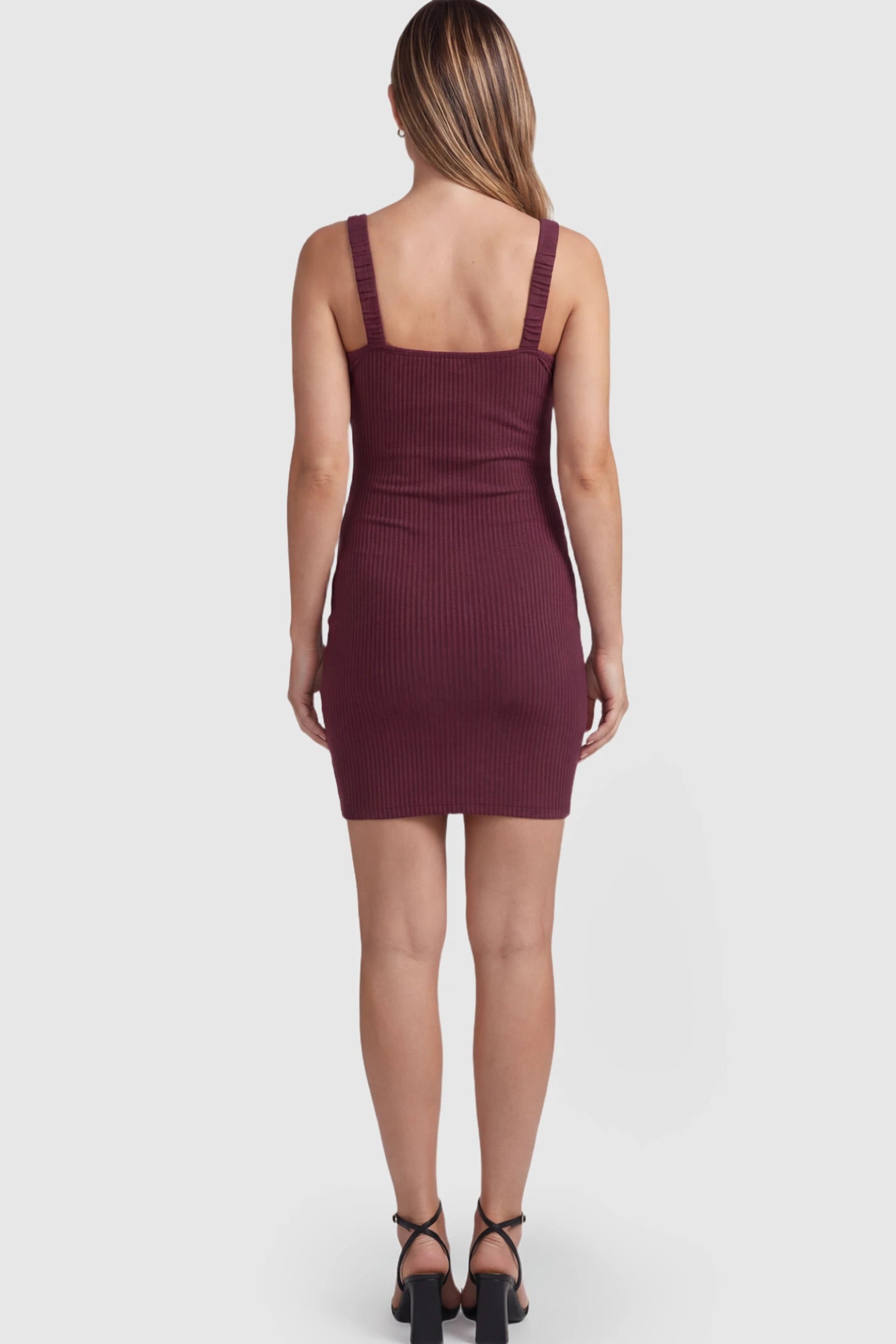 Ribbed Button Down Bodycon Maternity Short Dress Ribbed Button-Down Bodycon Maternity Short Dress in Burgundy on a pregnant model.