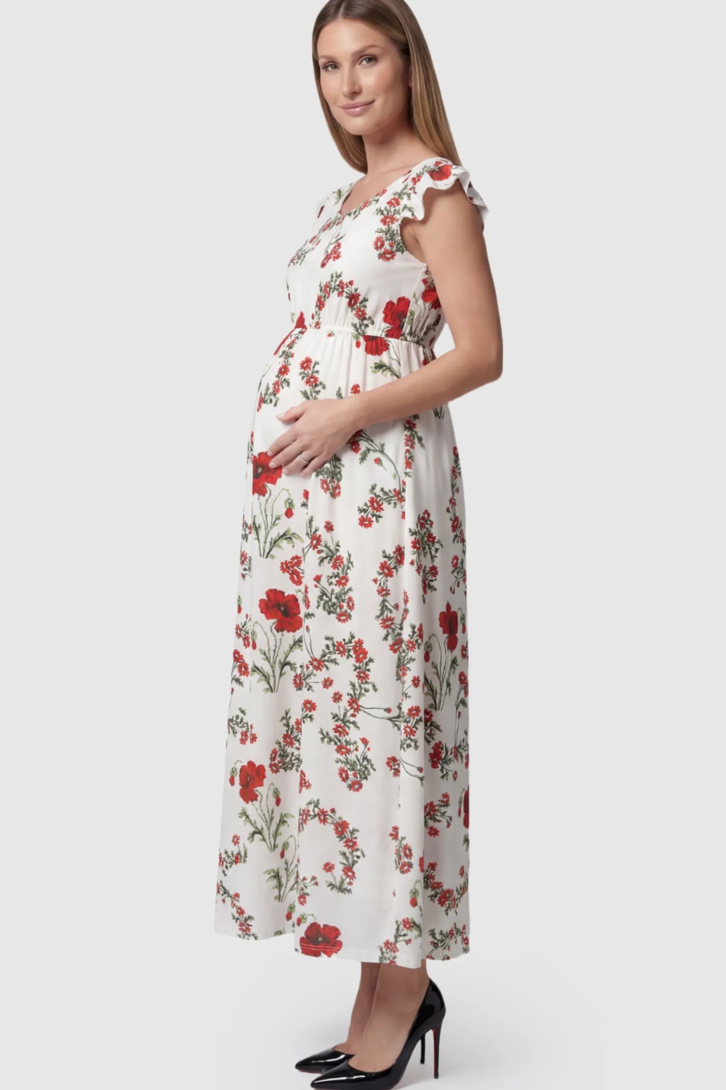 Floral Print Scoop Neck Maxi Maternity Dress in White with Red Poppy Prints featuring ruffle sleeves on a pregnant model.