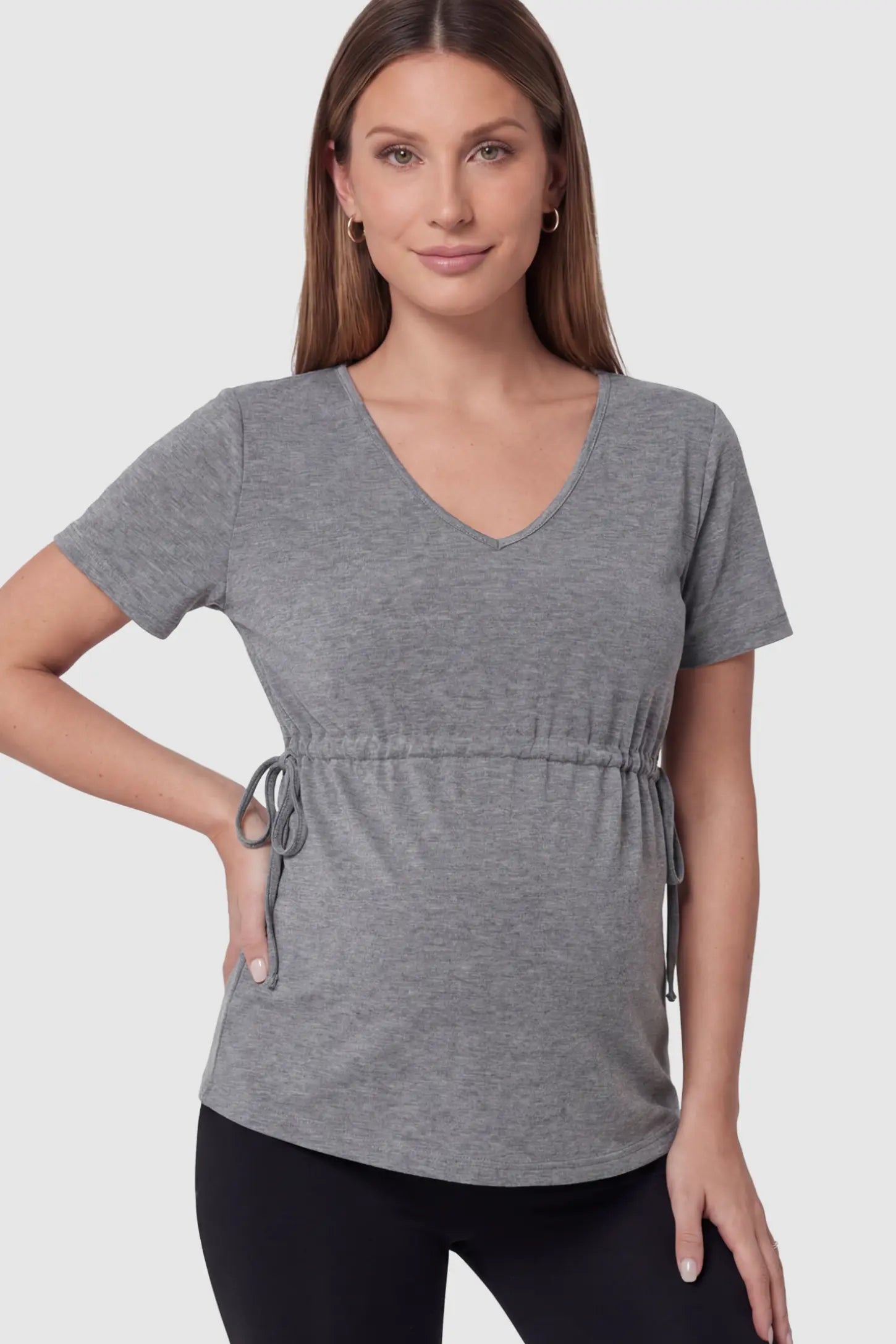 Cinched Waist Short Sleeve Maternity Tunic Top Cinched Waist Short Sleeve Maternity Tunic in Gray featuring a lightweight, stretchy fabric on a pregnant model in front view.