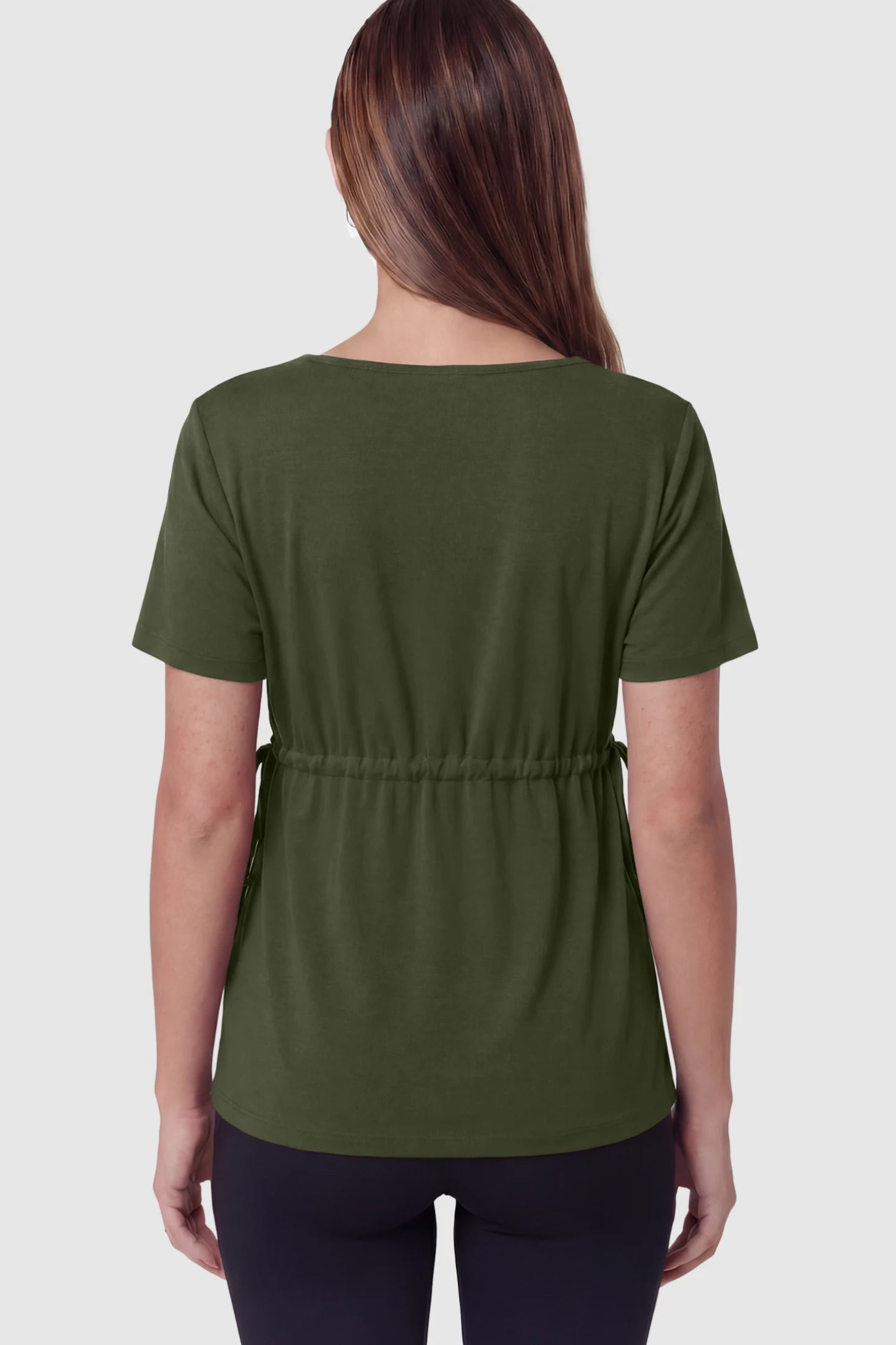 Cinched Waist Short Sleeve Maternity Tunic Top Cinched Waist Short Sleeve Maternity Tunic in Military Green featuring a curved silhouette on a pregnant model in back view.