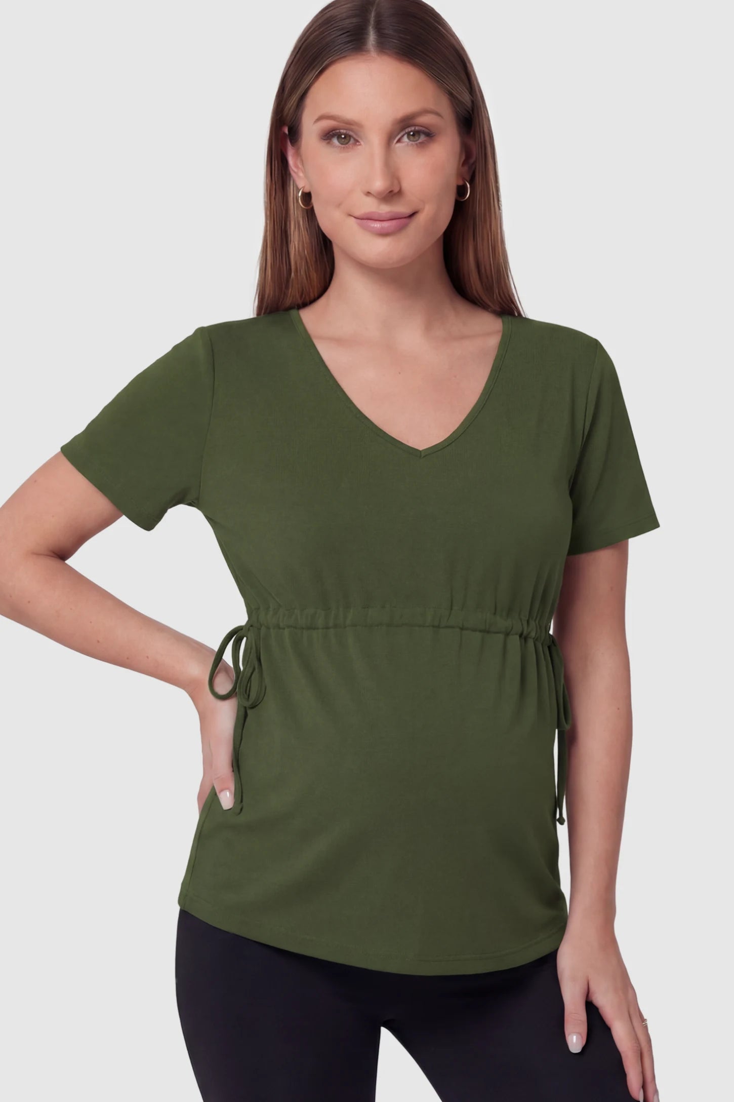 Cinched Waist Short Sleeve Maternity Tunic Top Cinched Waist Short Sleeve Maternity Tunic in Military Green featuring a curved silhouette on a pregnant model in front view.