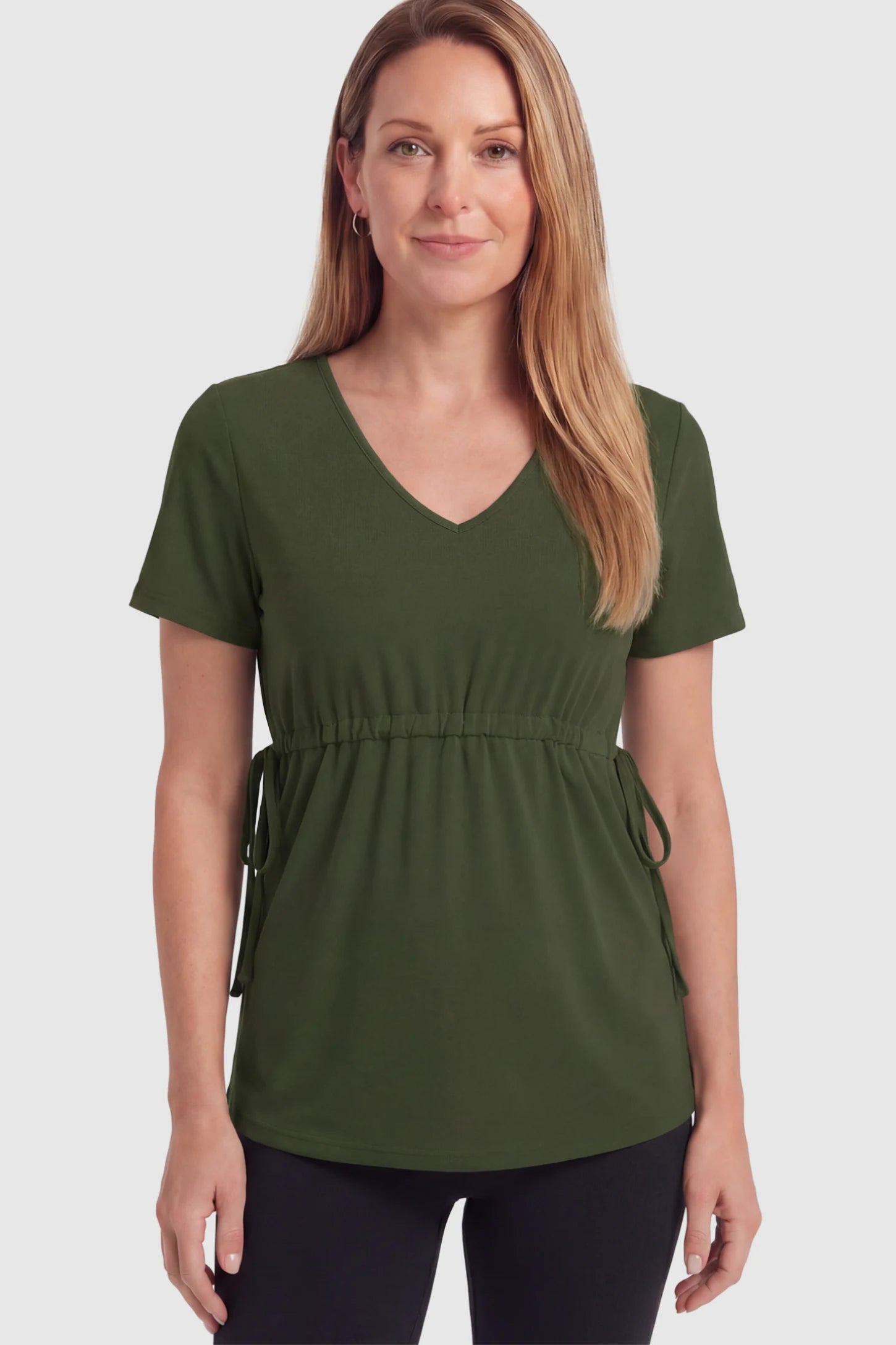 Cinched Waist Short Sleeve Maternity Tunic Top Cinched Waist Short Sleeve Maternity Tunic in Military Green with a cinched waistline on a postpartum model in front view.