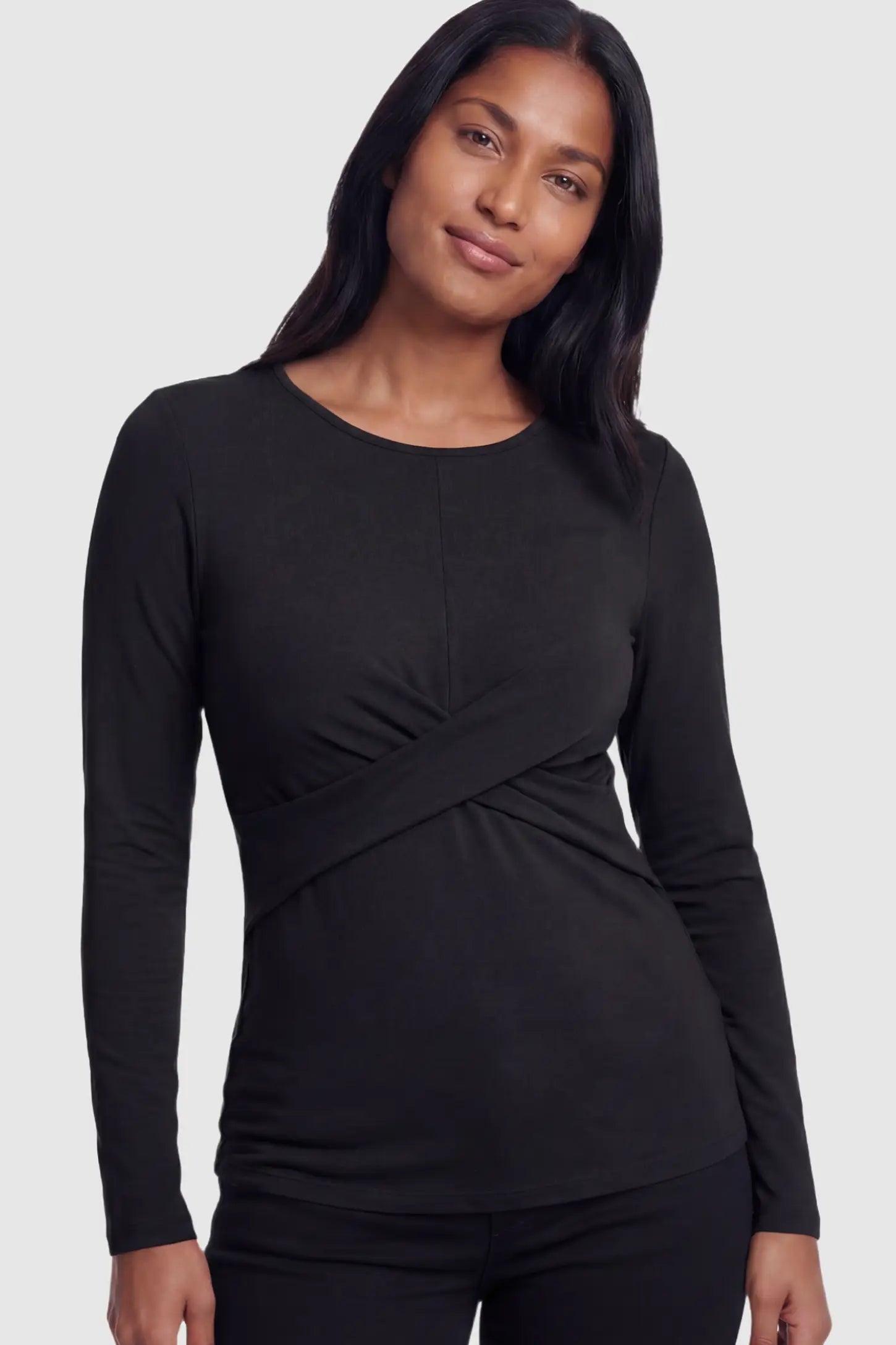 Cross Front Long Sleeve Maternity Top Cross Front Long Sleeve Maternity Top in Black featuring a crossover waist detail on a non pregnant model.