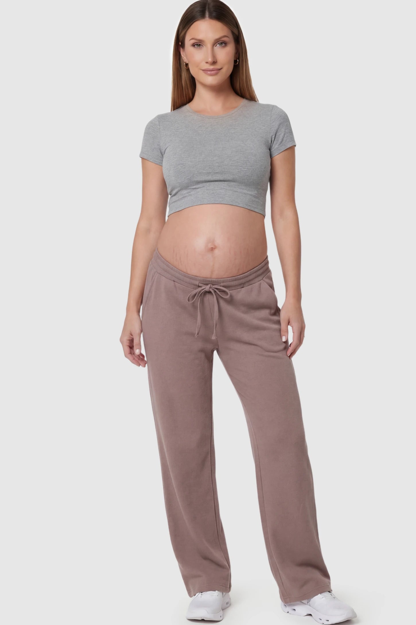 Drawstring Waffle Knit Wide Leg Maternity Lounge Pants Drawstring Waffle Knit Wide Leg Maternity Casual Pants in Brown featuring an adjustable waistband on a pregnant model.