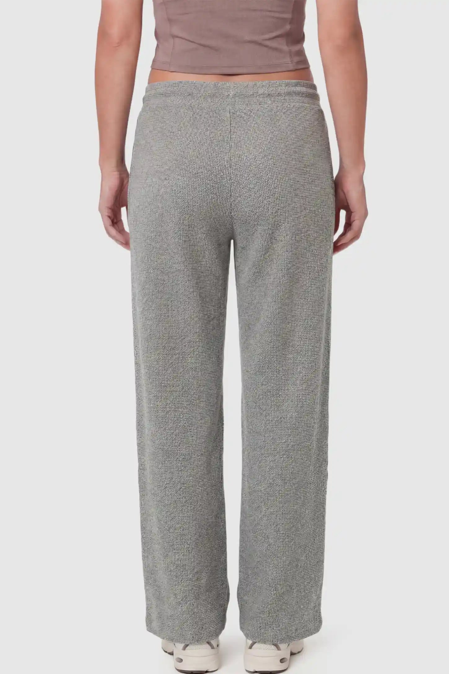 Drawstring Waffle Knit Wide Leg Maternity Lounge Pants Drawstring Waffle Knit Wide Leg Maternity Casual Pants in Gray featuring an adjustable waistband on a pregnant model.