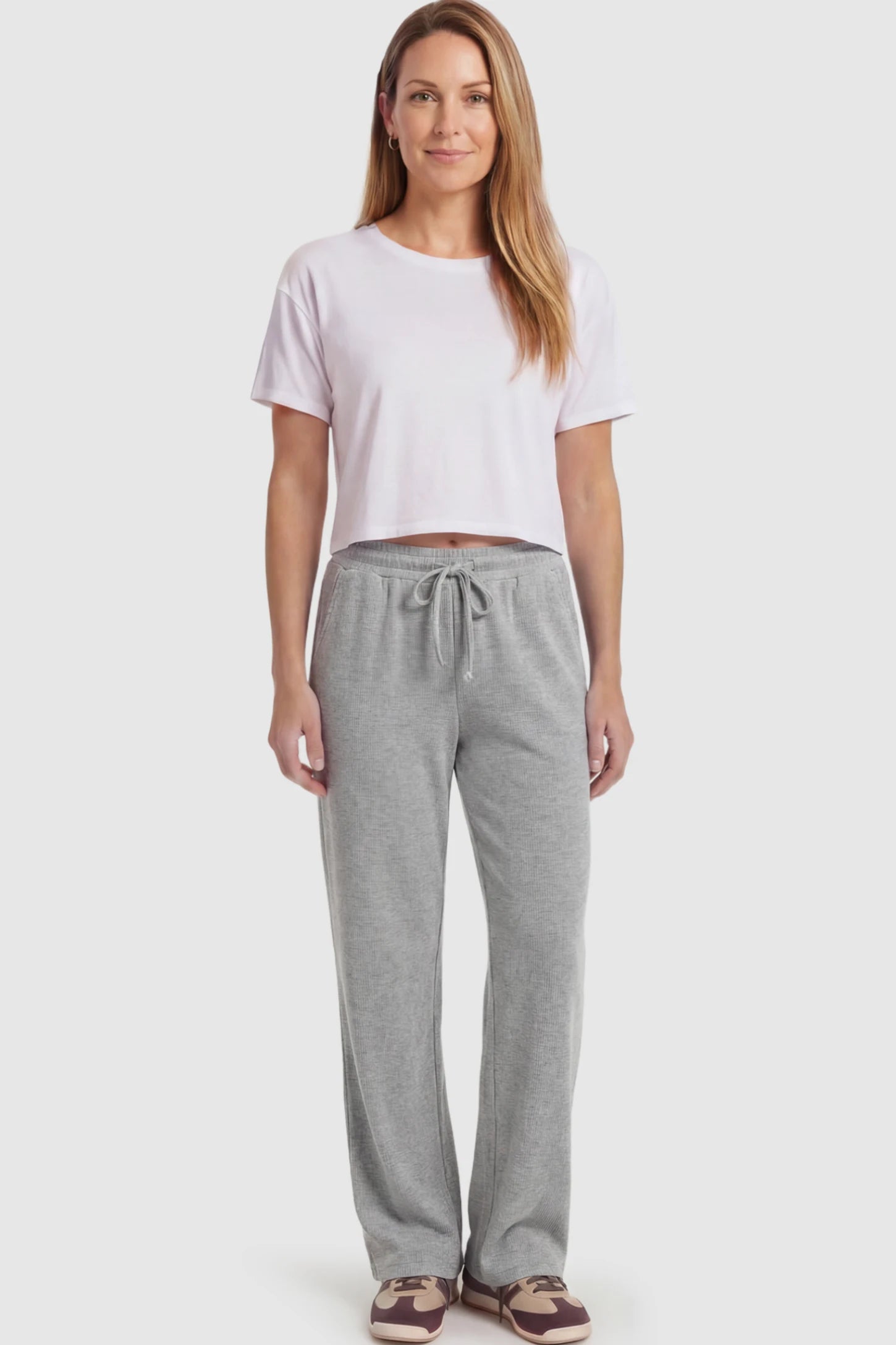 Drawstring Waffle Knit Wide Leg Maternity Lounge Pants Drawstring Waffle Knit Wide Leg Maternity Casual Pants in Gray featuring an adjustable waistband on a postpartum model.