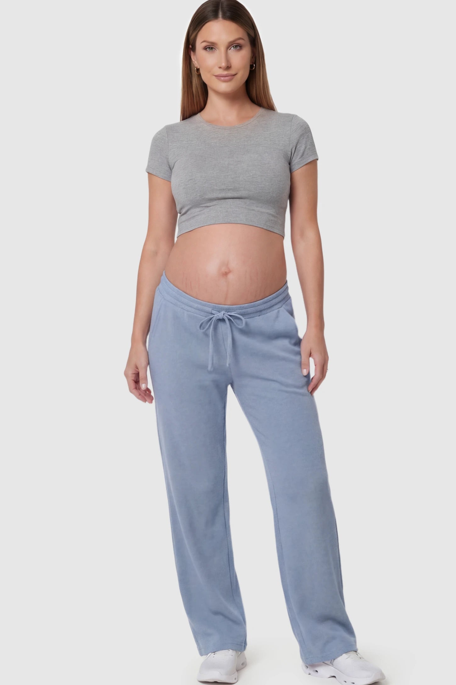 Drawstring Waffle Knit Wide Leg Maternity Lounge Pants Drawstring Waffle Knit Wide Leg Maternity Casual Pants in Blue featuring an adjustable waistband on a pregnant model.