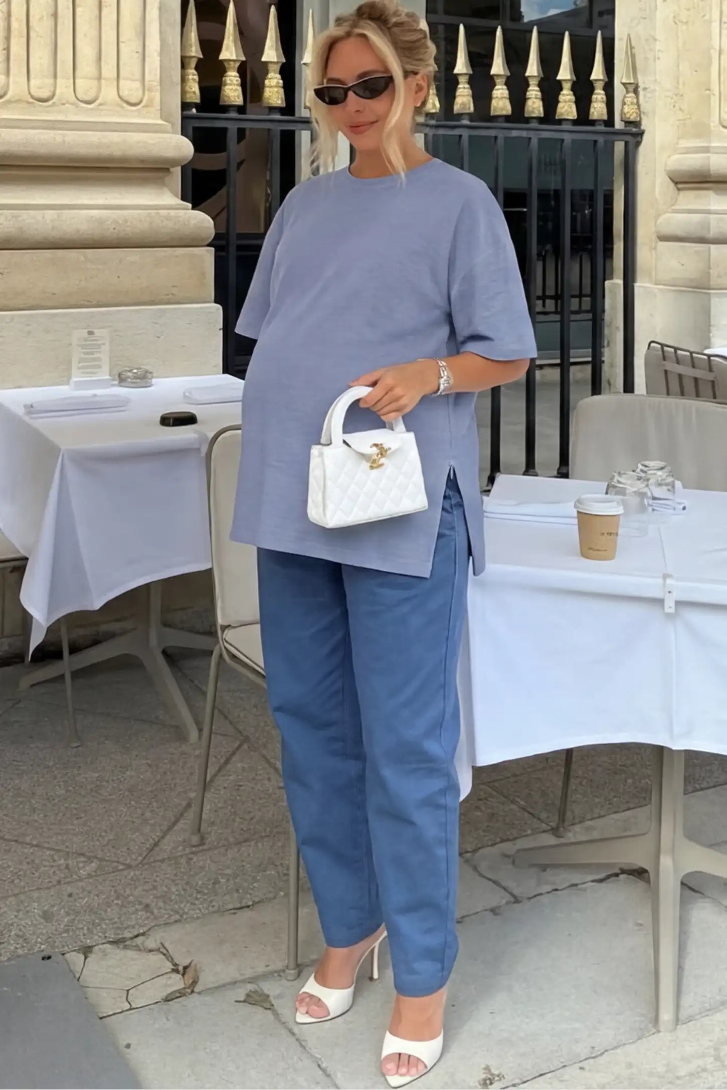 Oversized Short Sleeve Maternity T-Shirt Textured Oversized Short Sleeve Maternity T-Shirt in Light Blue featuring a side-slit hem and drop shoulders on a pregnant model.