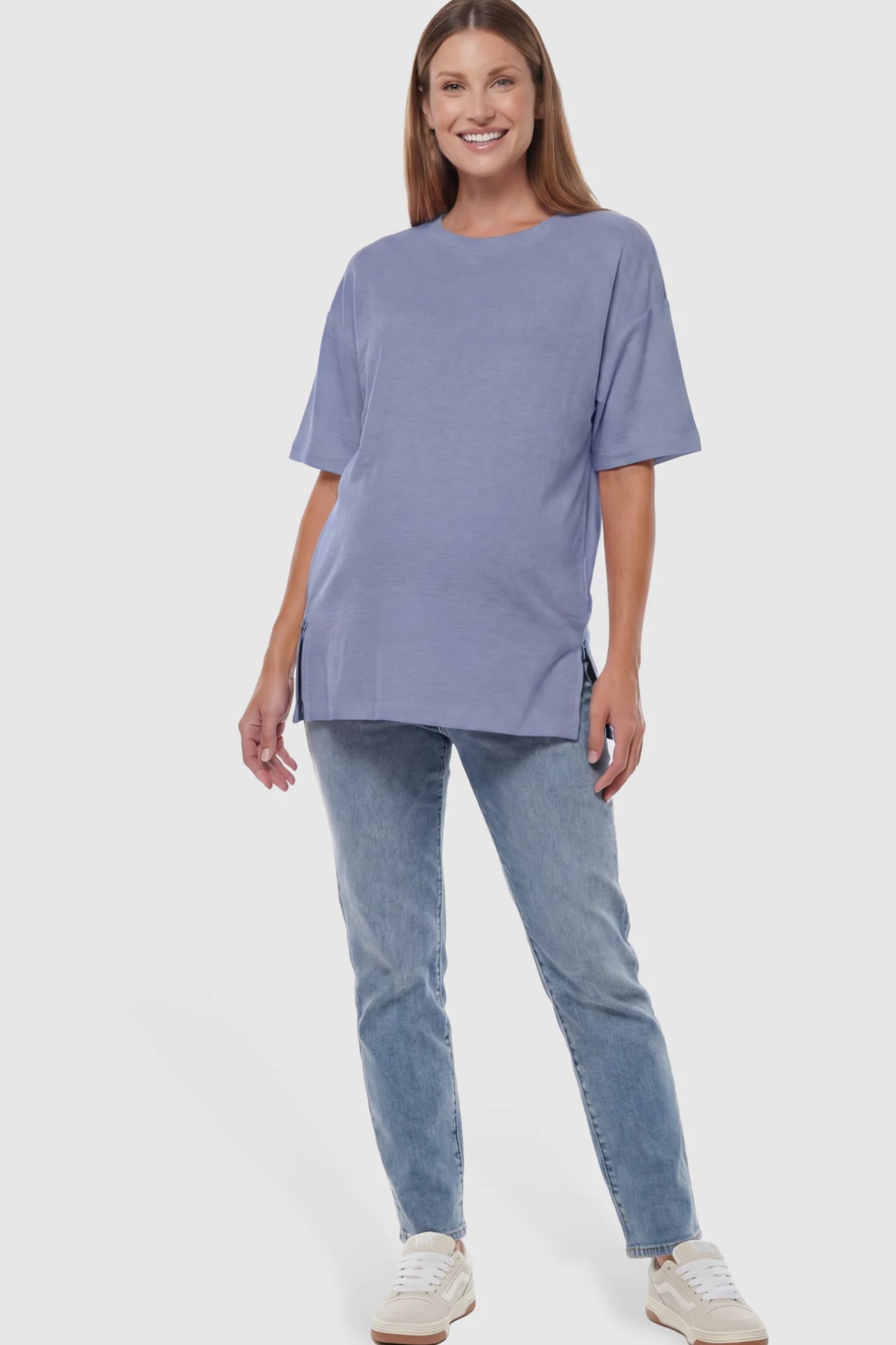 Oversized Short Sleeve Maternity T-Shirt Textured Oversized Short Sleeve Maternity T-Shirt in Light Blue featuring a side-slit hem and drop shoulders on a model.