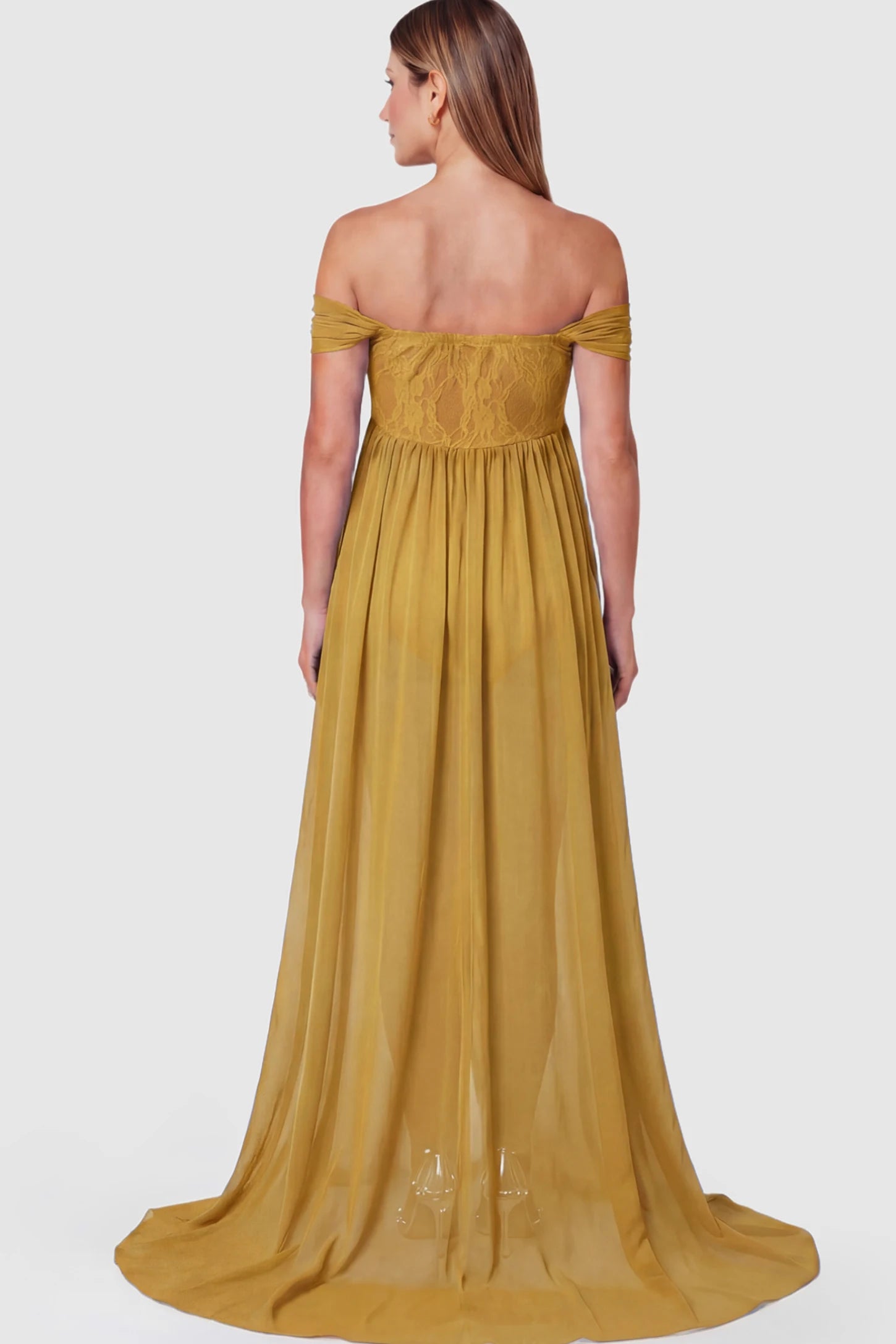 Lace Off Shoulder Slit Front Maternity Photoshoot Gown Lace Off Shoulder Slit Front Maternity Photoshoot Gown in apricot yellow on a pregnant model.