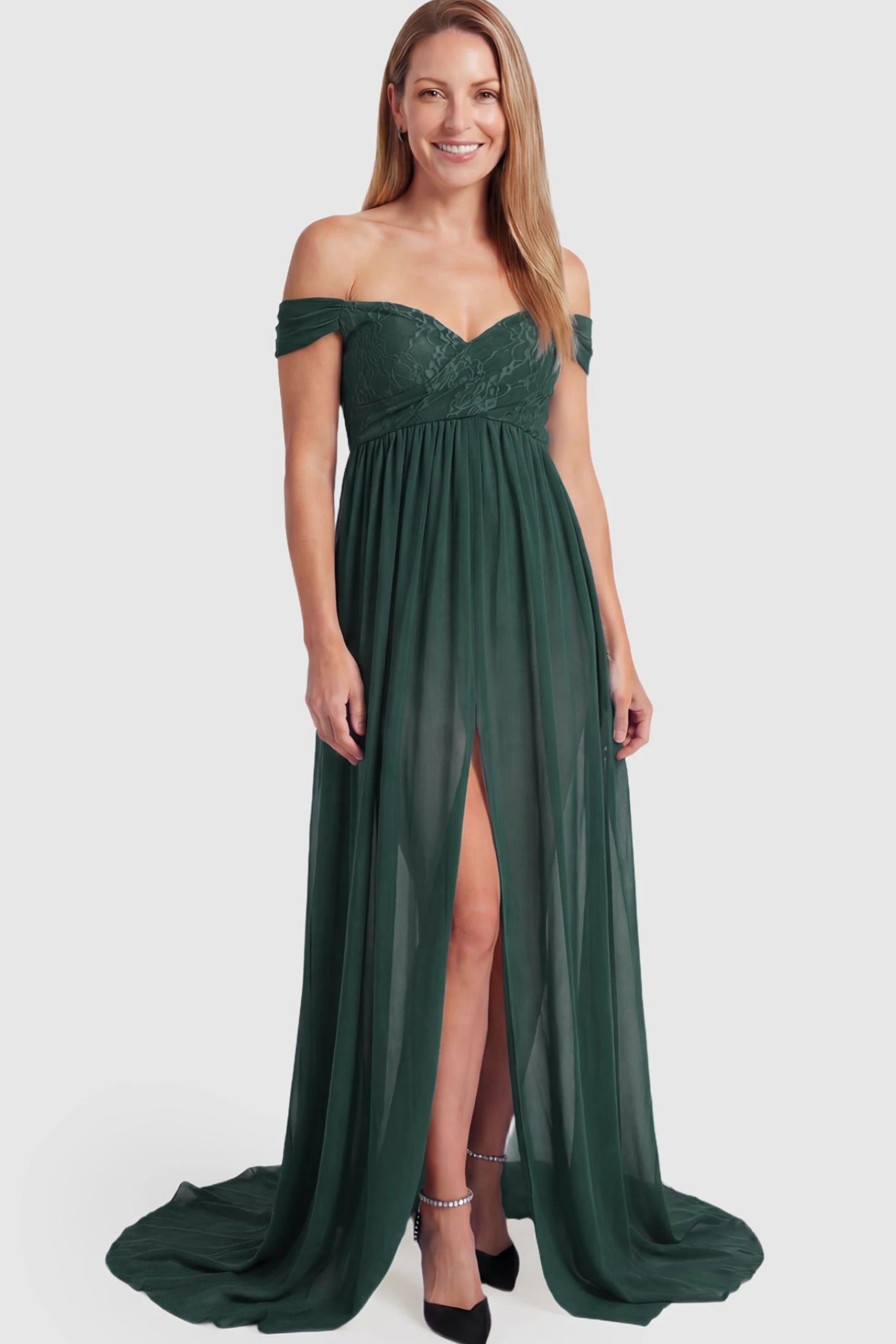 Lace Off Shoulder Slit Front Maternity Photoshoot Gown Lace Off Shoulder Slit Front Maternity Photoshoot Gown in dark green featuring a flowy chiffon opening on a postpartum model.