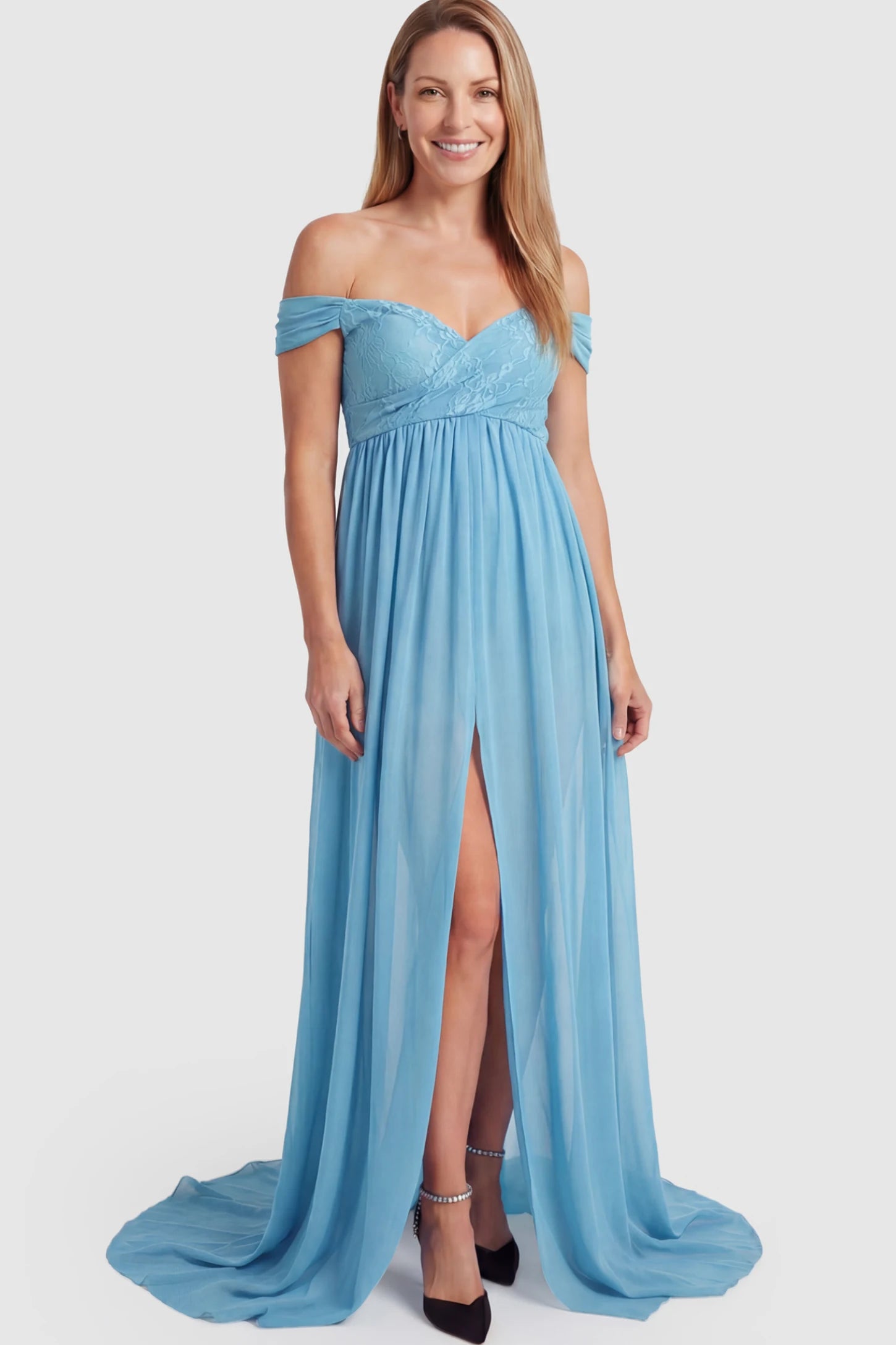 Lace Off Shoulder Slit Front Maternity Photoshoot Gown Lace Off Shoulder Slit Front Maternity Photoshoot Gown in light blue featuring a flowy chiffon opening on a postpartum model.
