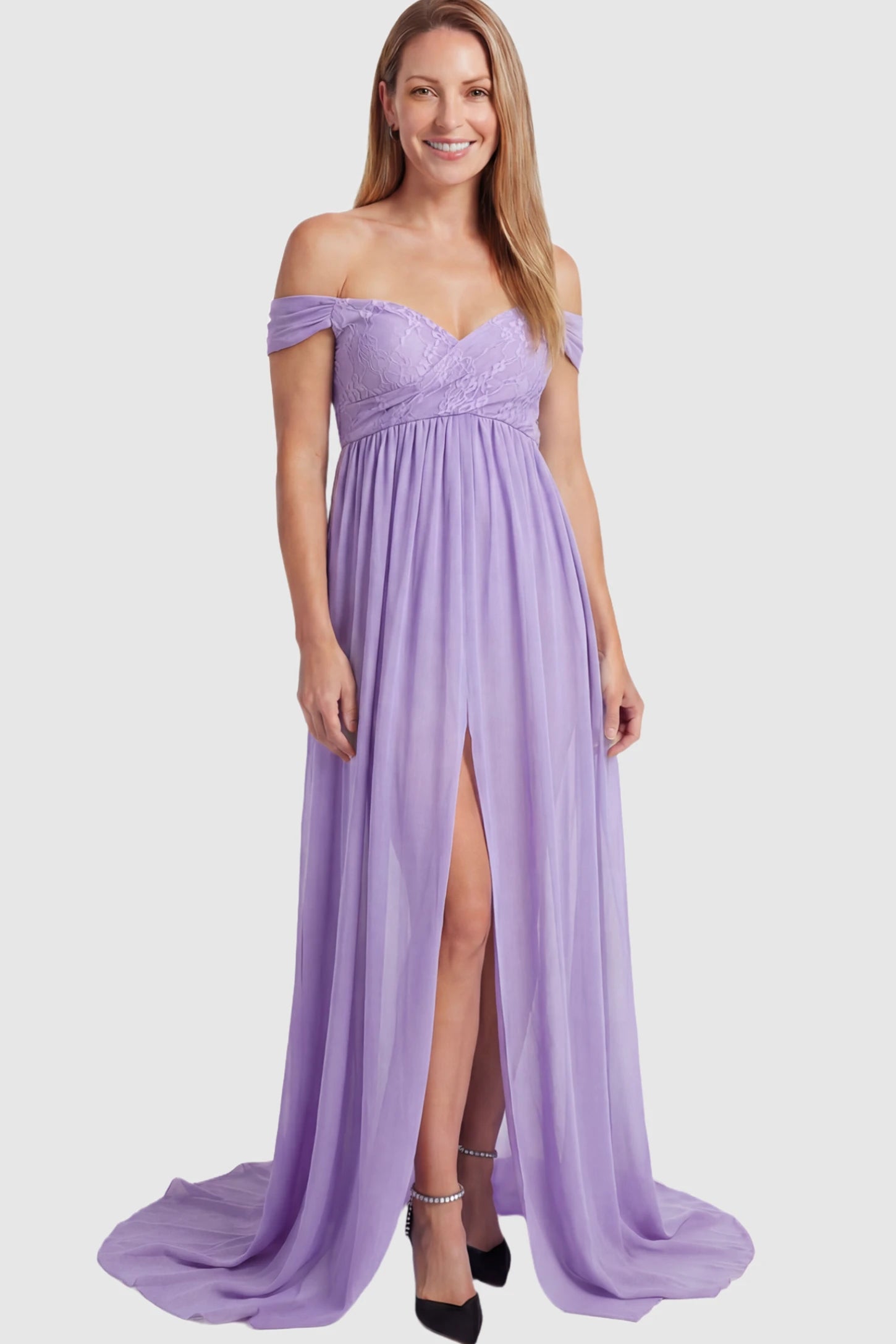 Lace Off Shoulder Slit Front Maternity Photoshoot Gown Lace Off Shoulder Slit Front Maternity Photoshoot Gown in light purple featuring a flowy chiffon opening on a postpartum model.