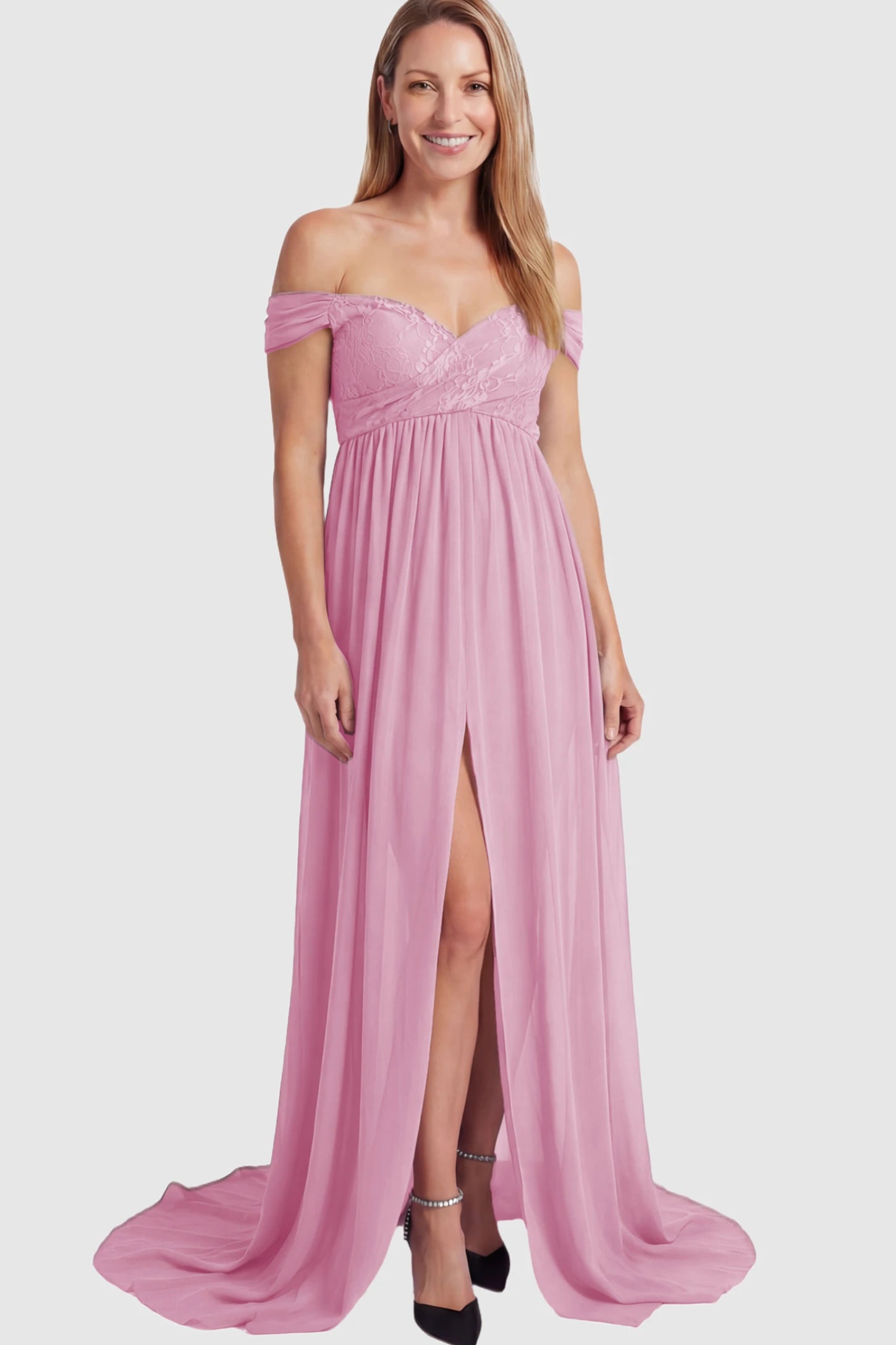 Lace Off Shoulder Slit Front Maternity Photoshoot Gown Lace Off Shoulder Slit Front Maternity Photoshoot Gown in Pink featuring a flowy chiffon opening on a postpartum model.