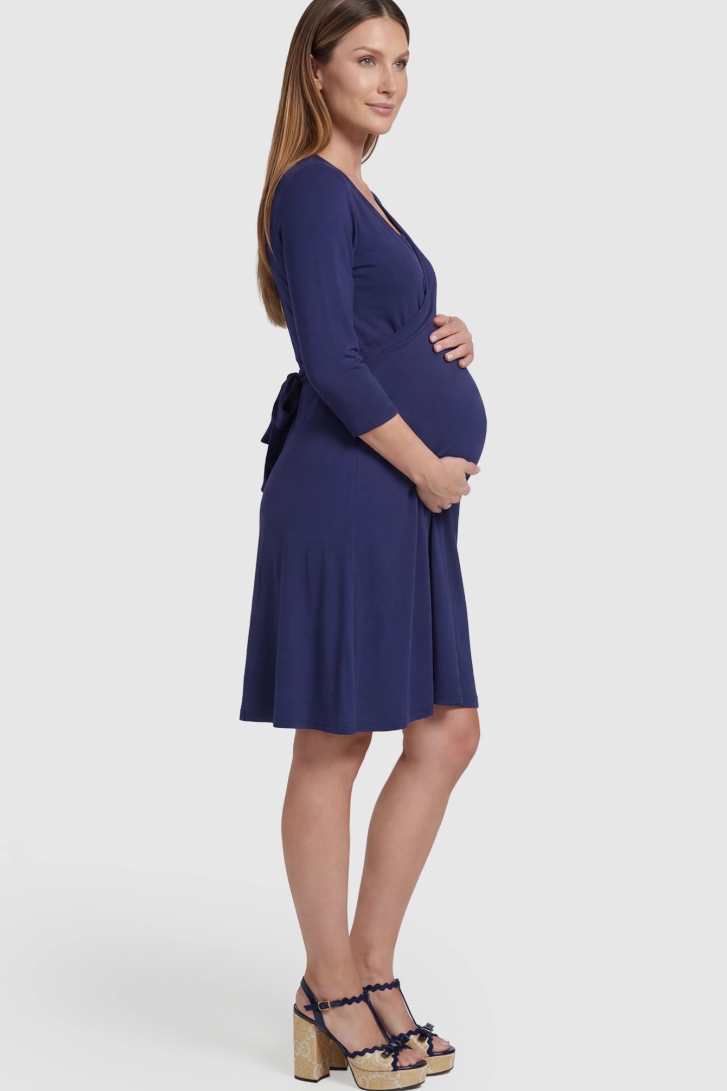 Layered Wrap Front Maternity Nursing Dress in Dark Blue featuring a double-layer nursing opening on a pregnant model.