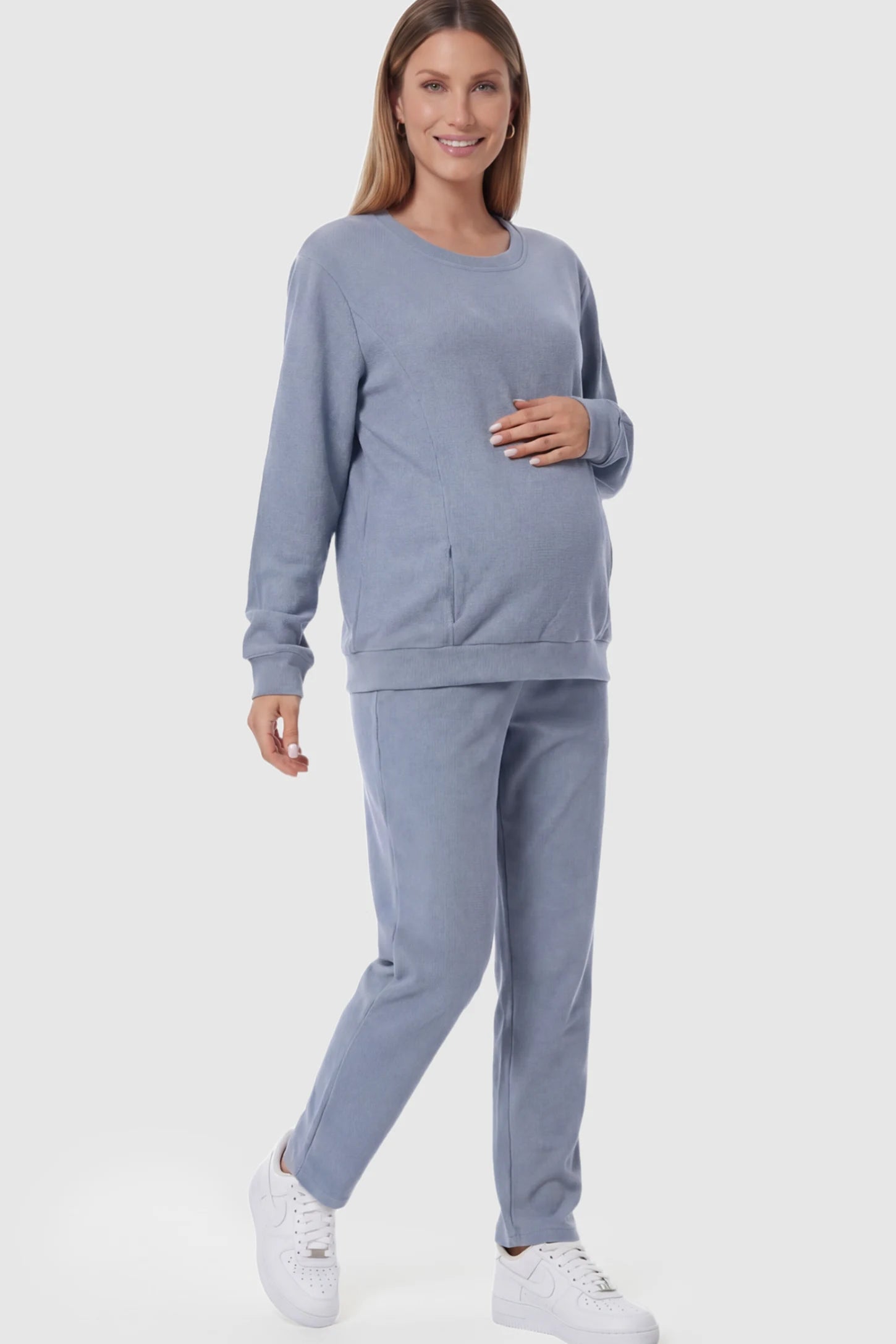 Waffle Knit Long Sleeve Maternity Pullover Sweatshirt Waffle Knit Long Sleeve Maternity Pullover Sweatshirt in Dark Blue featuring hidden nursing zippers on a pregnant model.