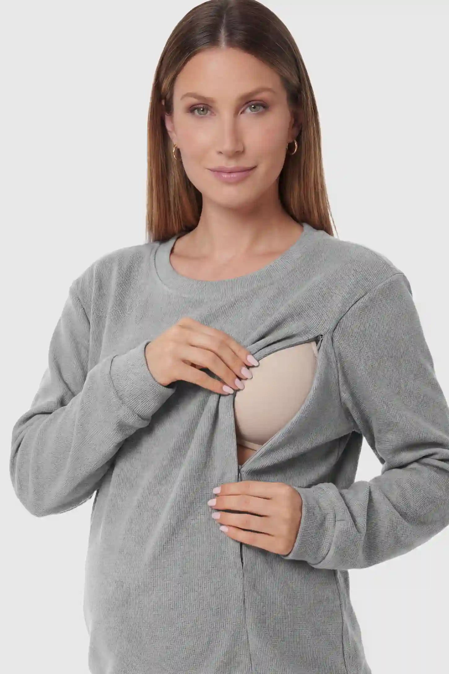 Waffle Knit Long Sleeve Maternity Pullover Sweatshirt Waffle Knit Long Sleeve Maternity Pullover Sweatshirt in Gray featuring hidden nursing zippers on a pregnant model.