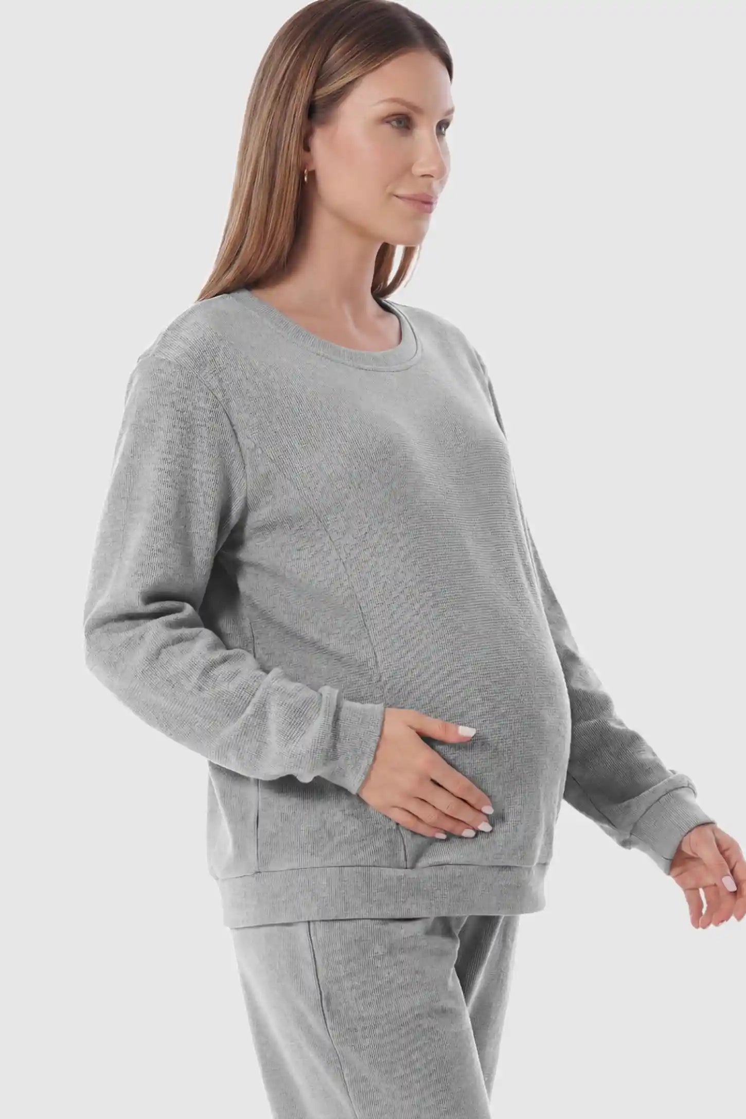 Waffle Knit Long Sleeve Maternity Pullover Sweatshirt Waffle Knit Long Sleeve Maternity Pullover Sweatshirt in Gray featuring hidden nursing zippers on a pregnant model.