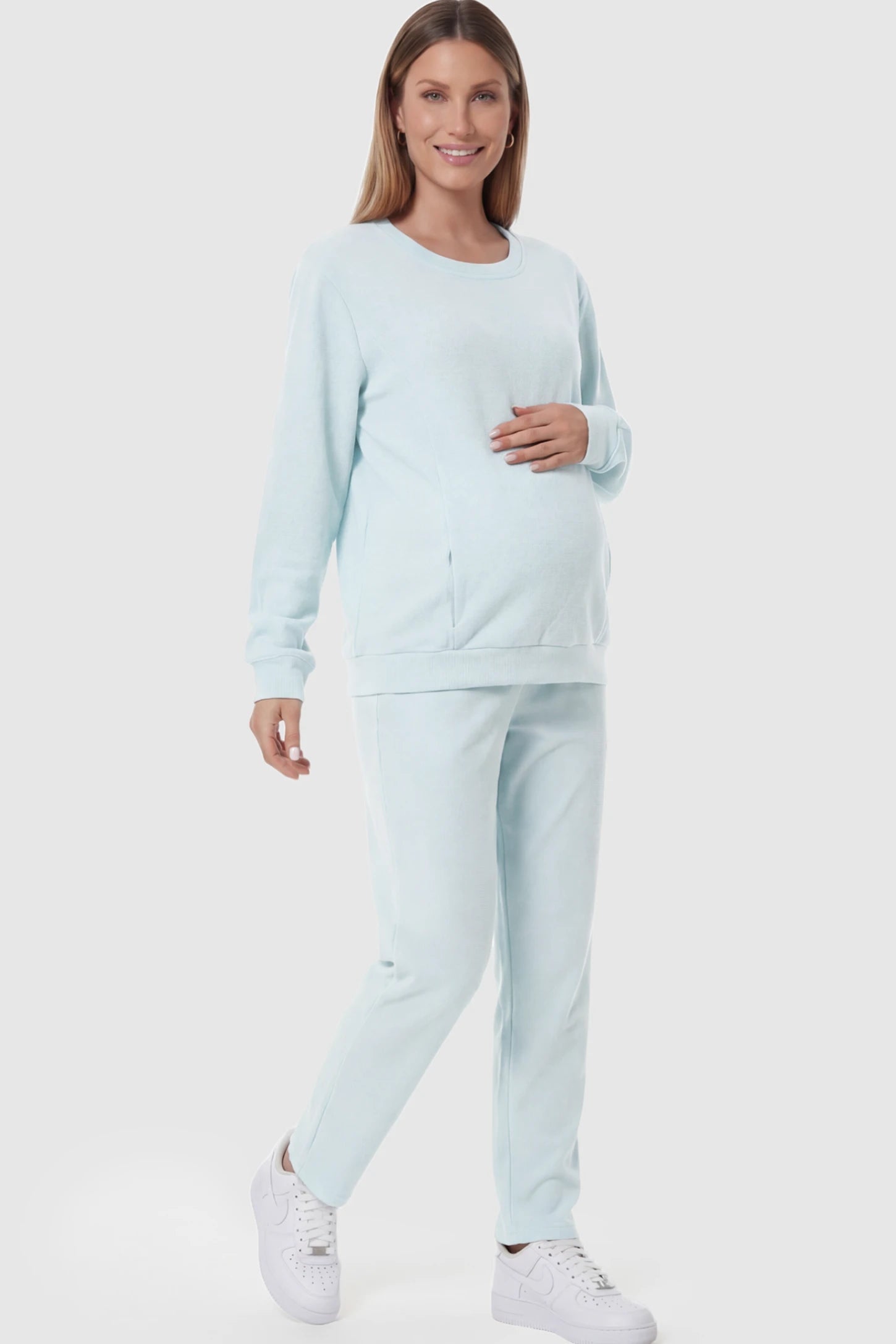 Waffle Knit Long Sleeve Maternity Pullover Sweatshirt Waffle Knit Long Sleeve Maternity Pullover Sweatshirt in Light Blue featuring hidden nursing zippers on a pregnant model.