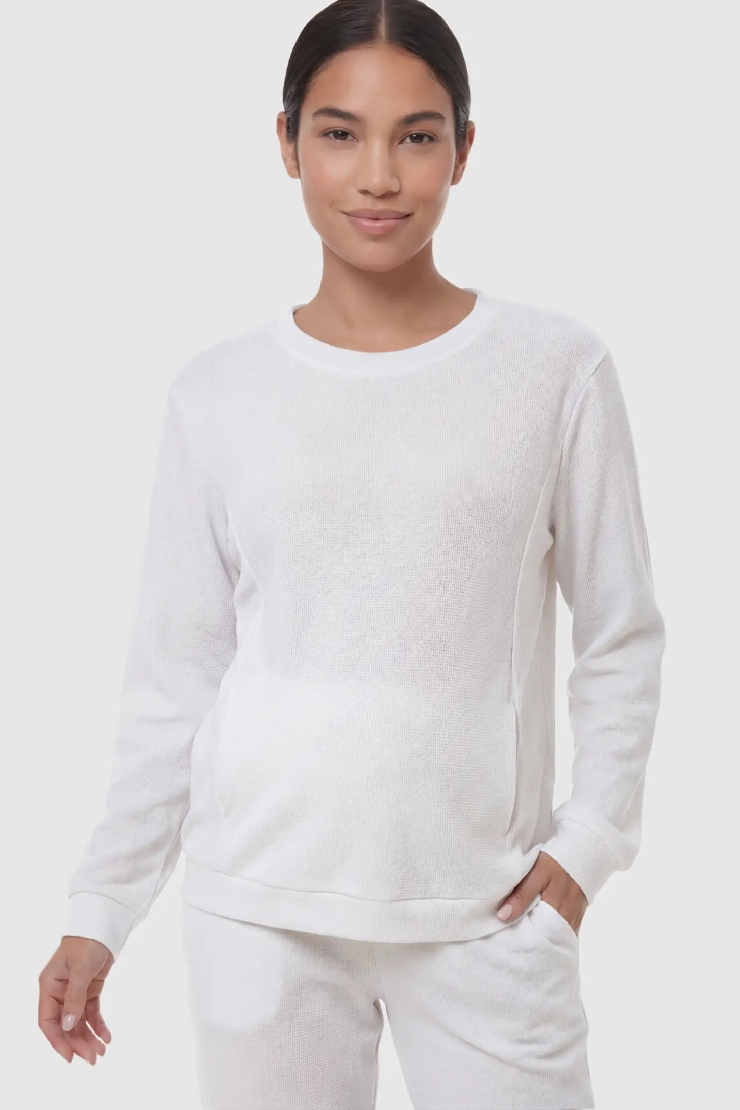 Waffle Knit Long Sleeve Maternity Pullover Sweatshirt Waffle Knit Long Sleeve Maternity Pullover Sweatshirt in White featuring hidden nursing zippers on a non pregnant model.